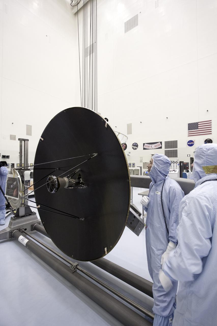 CAPE CANAVERAL, Fla. – Inside the Payload Hazardous Servicing Facility at NASA's Kennedy Space Center in Florida, technicians prepare the Mars Atmosphere and Volatile Evolution, or MAVEN spacecraft, for installation of the parabolic high gain antenna.      The antenna will communicate vast amounts of data to Earth during the mission. MAVEN is being prepared inside the facility for its scheduled November launch aboard a United Launch Alliance Atlas V rocket to Mars. Positioned in an orbit above the Red Planet, MAVEN will study the upper atmosphere of Mars in unprecedented detail. Photo credit: NASA/Jim Grossmann