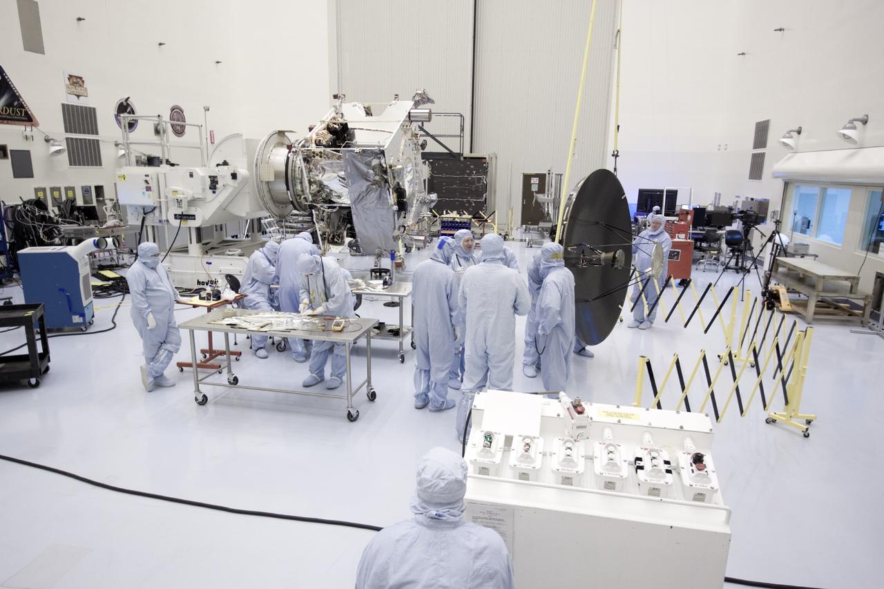 CAPE CANAVERAL, Fla. – Inside the Payload Hazardous Servicing Facility at NASA's Kennedy Space Center in Florida, preparations are under way to install the parabolic high gain antenna, right, onto the Mars Atmosphere and Volatile Evolution, or MAVEN spacecraft.      The antenna will communicate vast amounts of data to Earth during the mission. MAVEN is being prepared inside the facility for its scheduled November launch aboard a United Launch Alliance Atlas V rocket to Mars. Positioned in an orbit above the Red Planet, MAVEN will study the upper atmosphere of Mars in unprecedented detail. Photo credit: NASA/Jim Grossmann