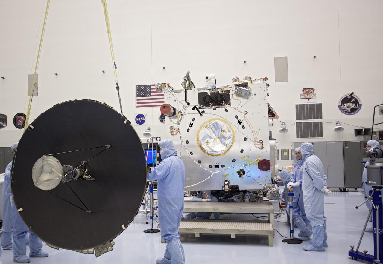 CAPE CANAVERAL, Fla. – At NASA’s Kennedy Space Center in Florida, technicians install the parabolic high gain antenna onto the Mars Atmosphere and Volatile Evolution, or MAVEN spacecraft, in the Payload Hazardous Servicing Facility. The antenna will communicate vast amounts of data to Earth during the mission.    MAVEN is being prepared inside the facility for its scheduled November launch aboard a United Launch Alliance Atlas V rocket to Mars. Positioned in an orbit above the Red Planet, MAVEN will study the upper atmosphere of Mars in unprecedented detail. Photo credit: NASA/Jim Grossmann