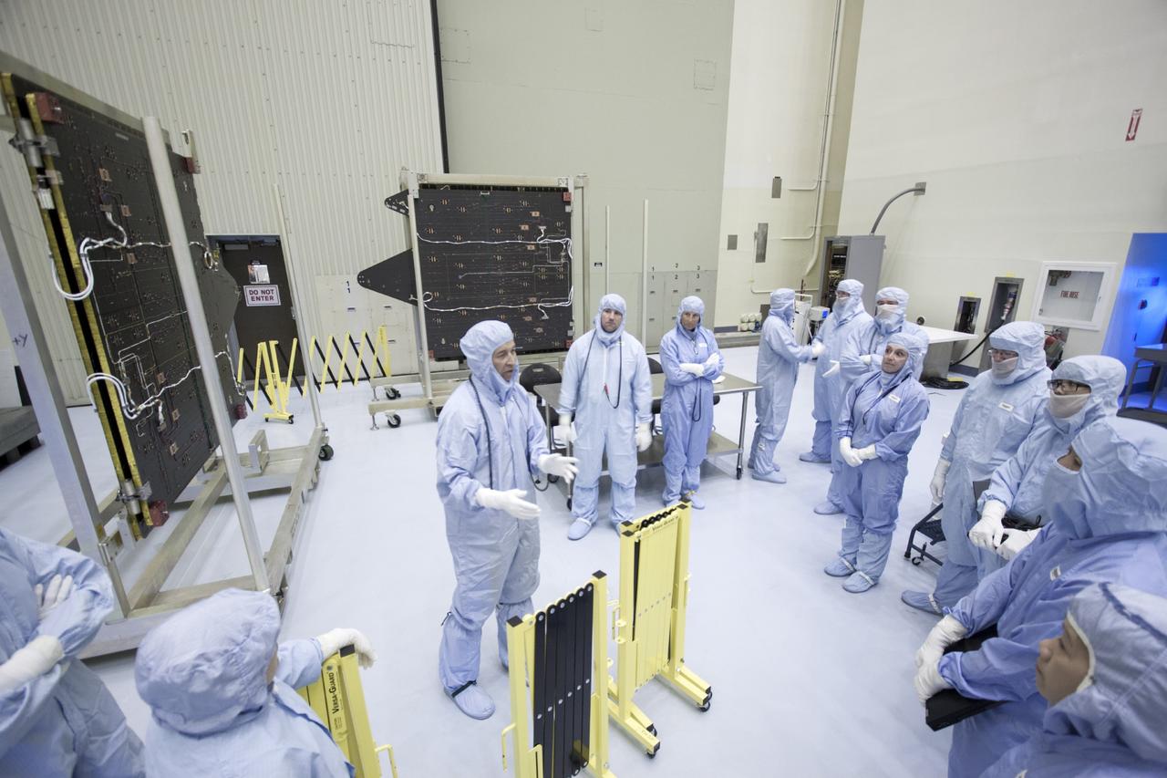 CAPE CANAVERAL, Fla. – Inside the Payload Hazardous Servicing Facility at NASA's Kennedy Space Center in Florida, technicians prepare to deploy the solar arrays for the Mars Atmosphere and Volatile Evolution, or MAVEN spacecraft. MAVEN is being prepared inside the facility for its scheduled November launch aboard a United Launch Alliance Atlas V rocket to Mars. Positioned in an orbit above the Red Planet, MAVEN will study the upper atmosphere of Mars in unprecedented detail. Photo credit: NASA/Jim Grossmann
