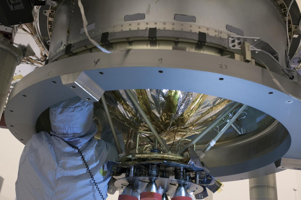 CAPE CANAVERAL, Fla. – Inside the Payload Hazardous Servicing Facility at NASA's Kennedy Space Center in Florida, engineers and technicians position the Mars Atmosphere and Volatile Evolution, or MAVEN, spacecraft on a work stand for electrical testing. MAVEN is being prepared for its scheduled launch in November from Cape Canaveral Air Force Station, Fla. atop a United Launch Alliance Atlas V rocket. Positioned in an orbit above the Red Planet, MAVEN will study the upper atmosphere of Mars in unprecedented detail. For more information, visit: http://www.nasa.gov/mission_pages/maven/main/index.html Photo credit: NASA/Jim Grossmann MAVEN is being prepared inside the facility for its scheduled November launch aboard a United Launch Alliance Atlas V rocket to Mars. Positioned in an orbit above the Red Planet, MAVEN will study the upper atmosphere of Mars in unprecedented detail. Photo credit: NASA/Jim Grossmann