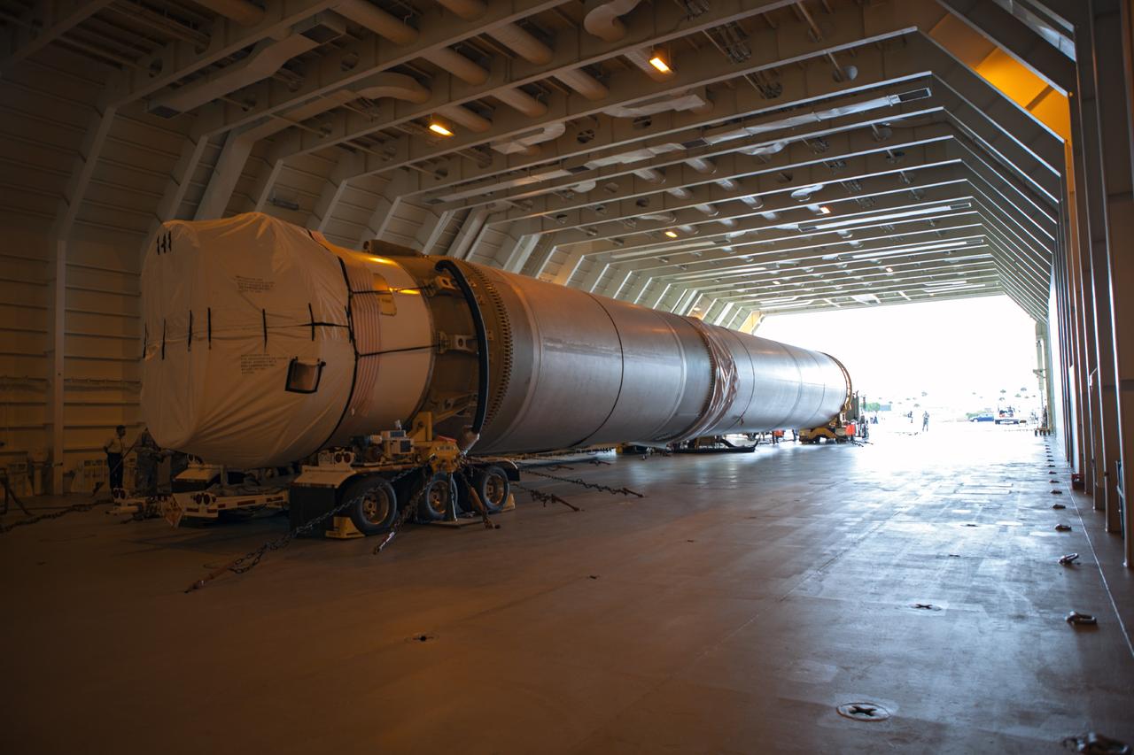 PORT CANAVERAL, Fla. – An Atlas V rocket is off loaded from the United Launch Alliance barge Delta Mariner that just arrived at Port Canaveral, Fla. The launch vehicle will boost the Mars Atmosphere and Volatile Evolution, or MAVEN, spacecraft to the Red Planet. The rocket will be transported to the Atlas Spaceflight Operations Center, or ASOC, at Cape Canaveral Air Force Station to begin processing.      MAVEN is being prepared for its scheduled launch in November from Cape Canaveral Air Force Station, Fla. atop a United Launch Alliance Atlas V rocket. Positioned in an orbit above the Red Planet, MAVEN will study the upper atmosphere of Mars in unprecedented detail. For more information, visit: http://www.nasa.gov/mission_pages/maven/main/index.html Photo credit: NASA/ Dimitri Gerondidakis