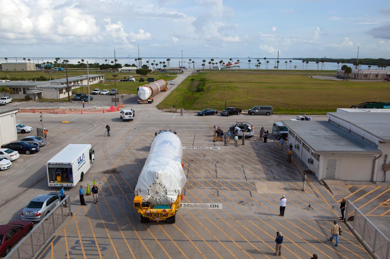 PORT CANAVERAL, Fla. – The Atlas V rocket first and second stages are off loaded from the United Launch Alliance barge Delta Mariner that just arrived at Port Canaveral, Fla. The launch vehicle will boost the Mars Atmosphere and Volatile Evolution, or MAVEN, spacecraft to the Red Planet. The rocket will be transported to the Atlas Spaceflight Operations Center, or ASOC, at Cape Canaveral Air Force Station to begin processing.      MAVEN is being prepared for its scheduled launch in November from Cape Canaveral Air Force Station, Fla. atop a United Launch Alliance Atlas V rocket. Positioned in an orbit above the Red Planet, MAVEN will study the upper atmosphere of Mars in unprecedented detail. For more information, visit: http://www.nasa.gov/mission_pages/maven/main/index.html Photo credit: NASA/ Dimitri Gerondidakis