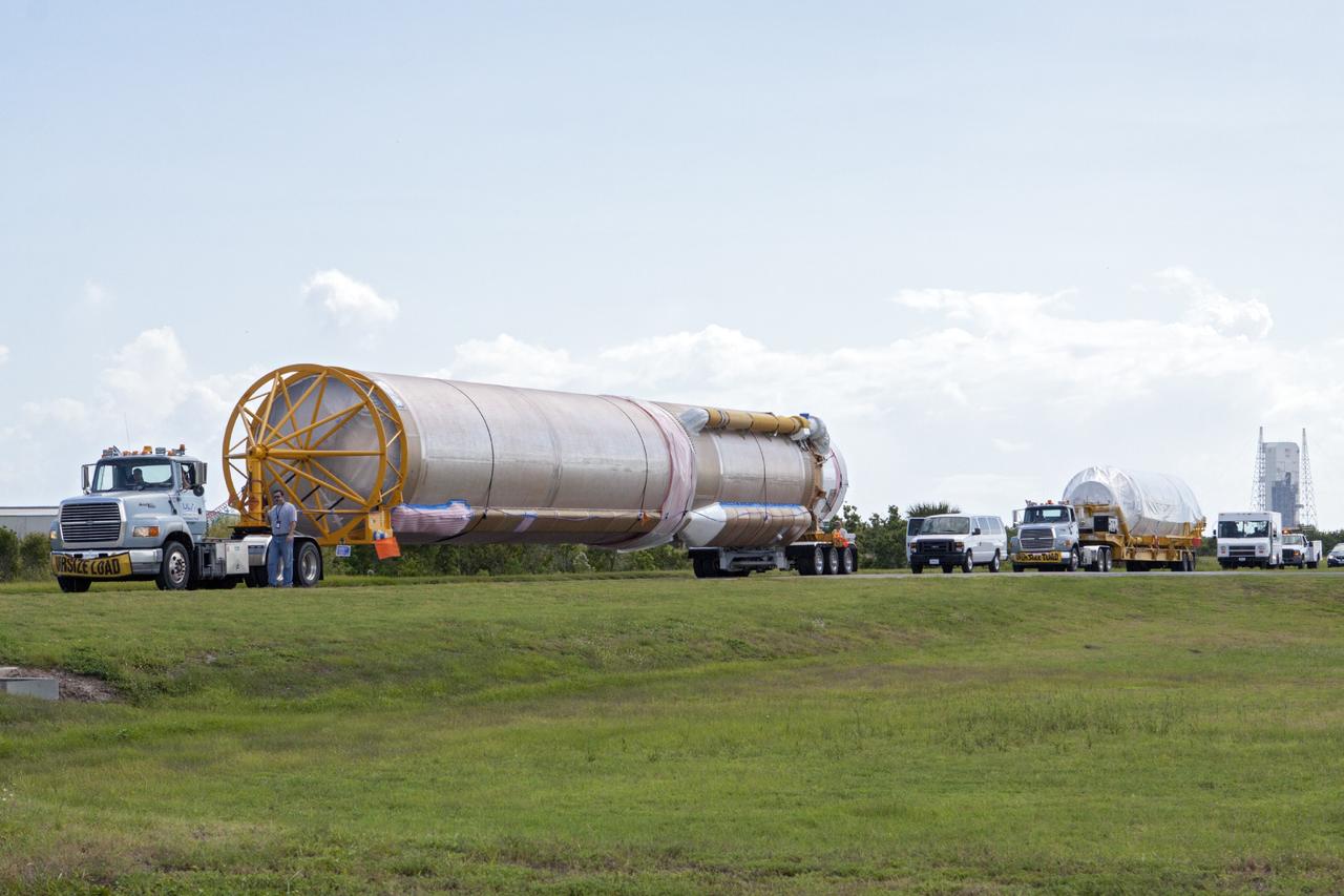CAPE CANAVERAL, Fla. – United Launch Alliance Atlas V rocket first and second stages arrive at Cape Canaveral Air Force Station, Fla., on their way to the Atlas Spaceflight Operations Center, or ASOC. There, the launch vehicle will begin processing for the Mars Atmosphere and Volatile Evolution, or MAVEN, spacecraft to the Red Planet.       MAVEN is being prepared for its scheduled launch in November from Cape Canaveral Air Force Station, Fla. atop a United Launch Alliance Atlas V rocket. Positioned in an orbit above the Red Planet, MAVEN will study the upper atmosphere of Mars in unprecedented detail. For more information, visit: http://www.nasa.gov/mission_pages/maven/main/index.html Photo credit: NASA/Kim Shiflett