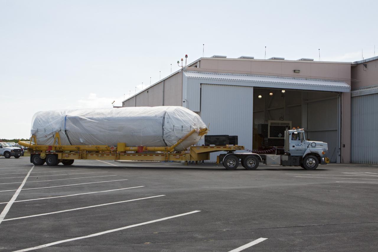 CAPE CANAVERAL, Fla. – United Launch Alliance Atlas V rocket first and second stages arrive at to the Atlas Spaceflight Operations Center, or ASOC, at Cape Canaveral Air Force Station. There, the launch vehicle will begin processing for the Mars Atmosphere and Volatile Evolution, or MAVEN, spacecraft to the Red Planet.       MAVEN is being prepared for its scheduled launch in November from Cape Canaveral Air Force Station, Fla. atop a United Launch Alliance Atlas V rocket. Positioned in an orbit above the Red Planet, MAVEN will study the upper atmosphere of Mars in unprecedented detail. For more information, visit: http://www.nasa.gov/mission_pages/maven/main/index.html Photo credit: NASA/Kim Shiflett