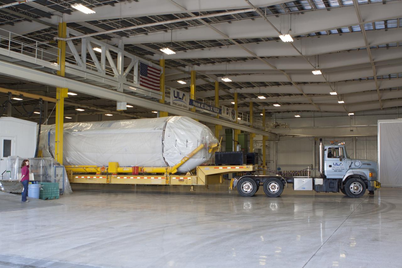 CAPE CANAVERAL, Fla. – United Launch Alliance Atlas V rocket first and second stages arrive at to the Atlas Spaceflight Operations Center, or ASOC, at Cape Canaveral Air Force Station. There, the launch vehicle will begin processing for the Mars Atmosphere and Volatile Evolution, or MAVEN, spacecraft to the Red Planet.       MAVEN is being prepared for its scheduled launch in November from Cape Canaveral Air Force Station, Fla. atop a United Launch Alliance Atlas V rocket. Positioned in an orbit above the Red Planet, MAVEN will study the upper atmosphere of Mars in unprecedented detail. For more information, visit: http://www.nasa.gov/mission_pages/maven/main/index.html Photo credit: NASA/Kim Shiflett