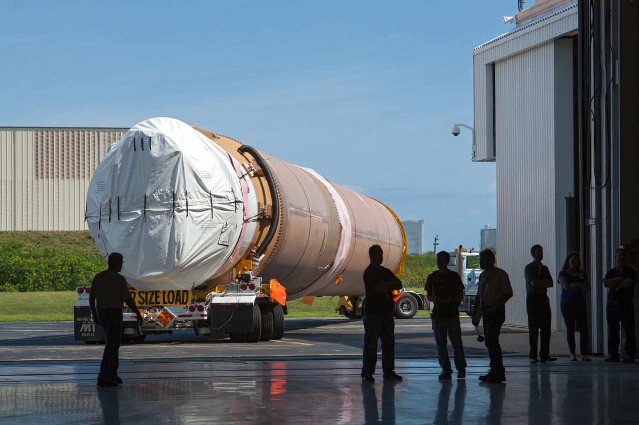 CAPE CANAVERAL, Fla. – United Launch Alliance Atlas V rocket first and second stages arrive at to the Atlas Spaceflight Operations Center, or ASOC, at Cape Canaveral Air Force Station. There, the launch vehicle will begin processing for the Mars Atmosphere and Volatile Evolution, or MAVEN, spacecraft to the Red Planet.       MAVEN is being prepared for its scheduled launch in November from Cape Canaveral Air Force Station, Fla. atop a United Launch Alliance Atlas V rocket. Positioned in an orbit above the Red Planet, MAVEN will study the upper atmosphere of Mars in unprecedented detail. For more information, visit: http://www.nasa.gov/mission_pages/maven/main/index.html Photo credit: NASA/Kim Shiflett