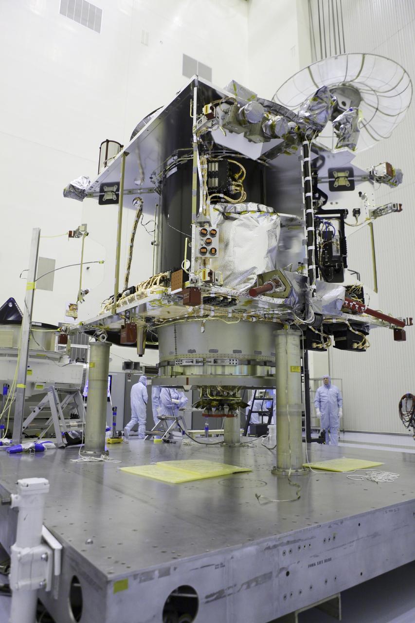 CAPE CANAVERAL, Fla. – Inside the Payload Hazardous Servicing Facility at NASA's Kennedy Space Center in Florida, technicians prepare to hoist the Mars Atmosphere and Volatile Evolution spacecraft, or MAVEN, onto the rotation fixture for further testing and prelaunch preparations next week. MAVEN is being readied for its scheduled November launch aboard a United Launch Alliance Atlas V rocket to Mars. Positioned in an orbit above the Red Planet, MAVEN will study the upper atmosphere of Mars in unprecedented detail. Photo credit: NASA/Chris Rhodes