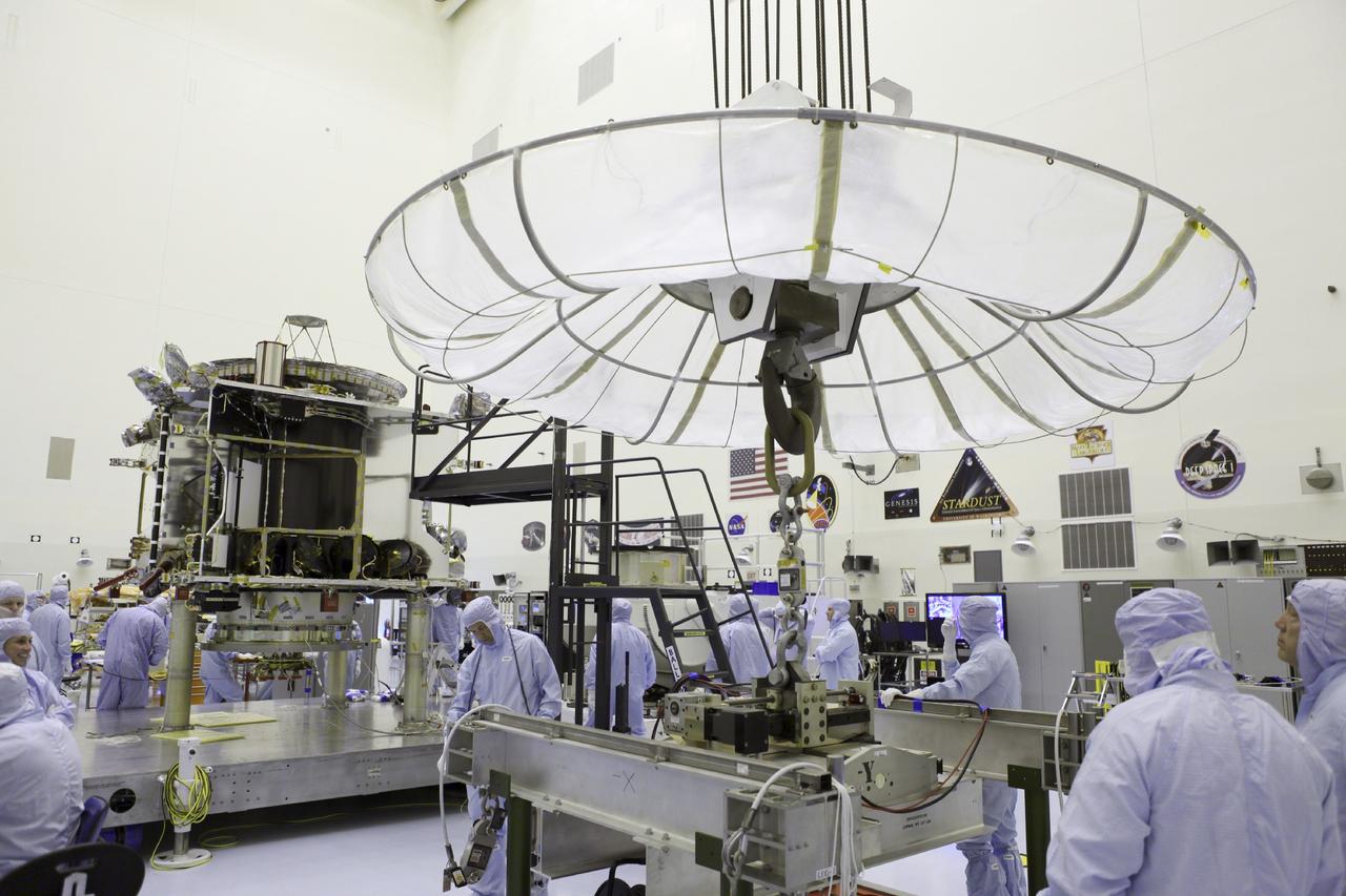 CAPE CANAVERAL, Fla. – Inside the Payload Hazardous Servicing Facility at NASA's Kennedy Space Center in Florida, technicians prepare to hoist the Mars Atmosphere and Volatile Evolution spacecraft, or MAVEN, onto the rotation fixture for further testing and prelaunch preparations next week. MAVEN is being readied for its scheduled November launch aboard a United Launch Alliance Atlas V rocket to Mars. Positioned in an orbit above the Red Planet, MAVEN will study the upper atmosphere of Mars in unprecedented detail. Photo credit: NASA/Chris Rhodes