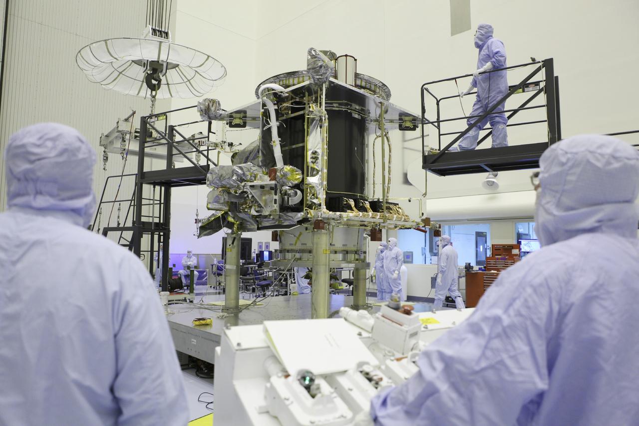 CAPE CANAVERAL, Fla. – Inside the Payload Hazardous Servicing Facility at NASA's Kennedy Space Center in Florida, technicians prepare to hoist the Mars Atmosphere and Volatile Evolution spacecraft, or MAVEN, onto the rotation fixture for further testing and prelaunch preparations next week. MAVEN is being readied for its scheduled November launch aboard a United Launch Alliance Atlas V rocket to Mars. Positioned in an orbit above the Red Planet, MAVEN will study the upper atmosphere of Mars in unprecedented detail. Photo credit: NASA/Chris Rhodes