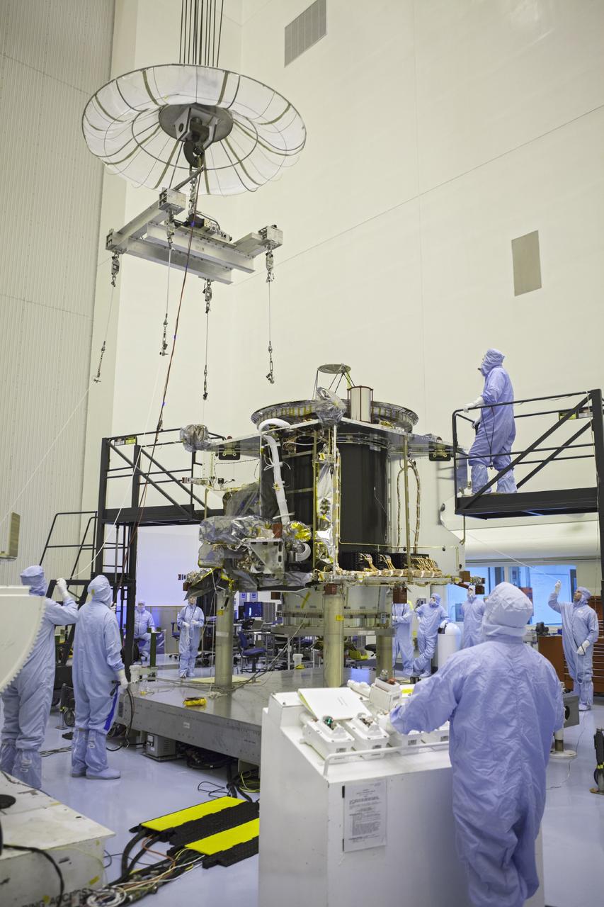 CAPE CANAVERAL, Fla. – Inside the Payload Hazardous Servicing Facility at NASA's Kennedy Space Center in Florida, technicians prepare to hoist the Mars Atmosphere and Volatile Evolution spacecraft, or MAVEN, onto the rotation fixture for further testing and prelaunch preparations next week. MAVEN is being readied for its scheduled November launch aboard a United Launch Alliance Atlas V rocket to Mars. Positioned in an orbit above the Red Planet, MAVEN will study the upper atmosphere of Mars in unprecedented detail. Photo credit: NASA/Chris Rhodes
