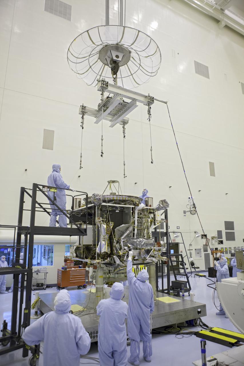 CAPE CANAVERAL, Fla. – Inside the Payload Hazardous Servicing Facility at NASA's Kennedy Space Center in Florida, technicians prepare to hoist the Mars Atmosphere and Volatile Evolution spacecraft, or MAVEN, onto the rotation fixture for further testing and prelaunch preparations next week. MAVEN is being readied for its scheduled November launch aboard a United Launch Alliance Atlas V rocket to Mars. Positioned in an orbit above the Red Planet, MAVEN will study the upper atmosphere of Mars in unprecedented detail. Photo credit: NASA/Chris Rhodes