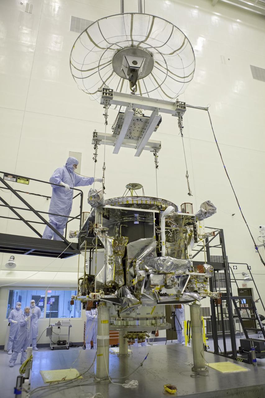 CAPE CANAVERAL, Fla. – Inside the Payload Hazardous Servicing Facility at NASA's Kennedy Space Center in Florida, technicians prepare to hoist the Mars Atmosphere and Volatile Evolution spacecraft, or MAVEN, onto the rotation fixture for further testing and prelaunch preparations next week. MAVEN is being readied for its scheduled November launch aboard a United Launch Alliance Atlas V rocket to Mars. Positioned in an orbit above the Red Planet, MAVEN will study the upper atmosphere of Mars in unprecedented detail. Photo credit: NASA/Chris Rhodes