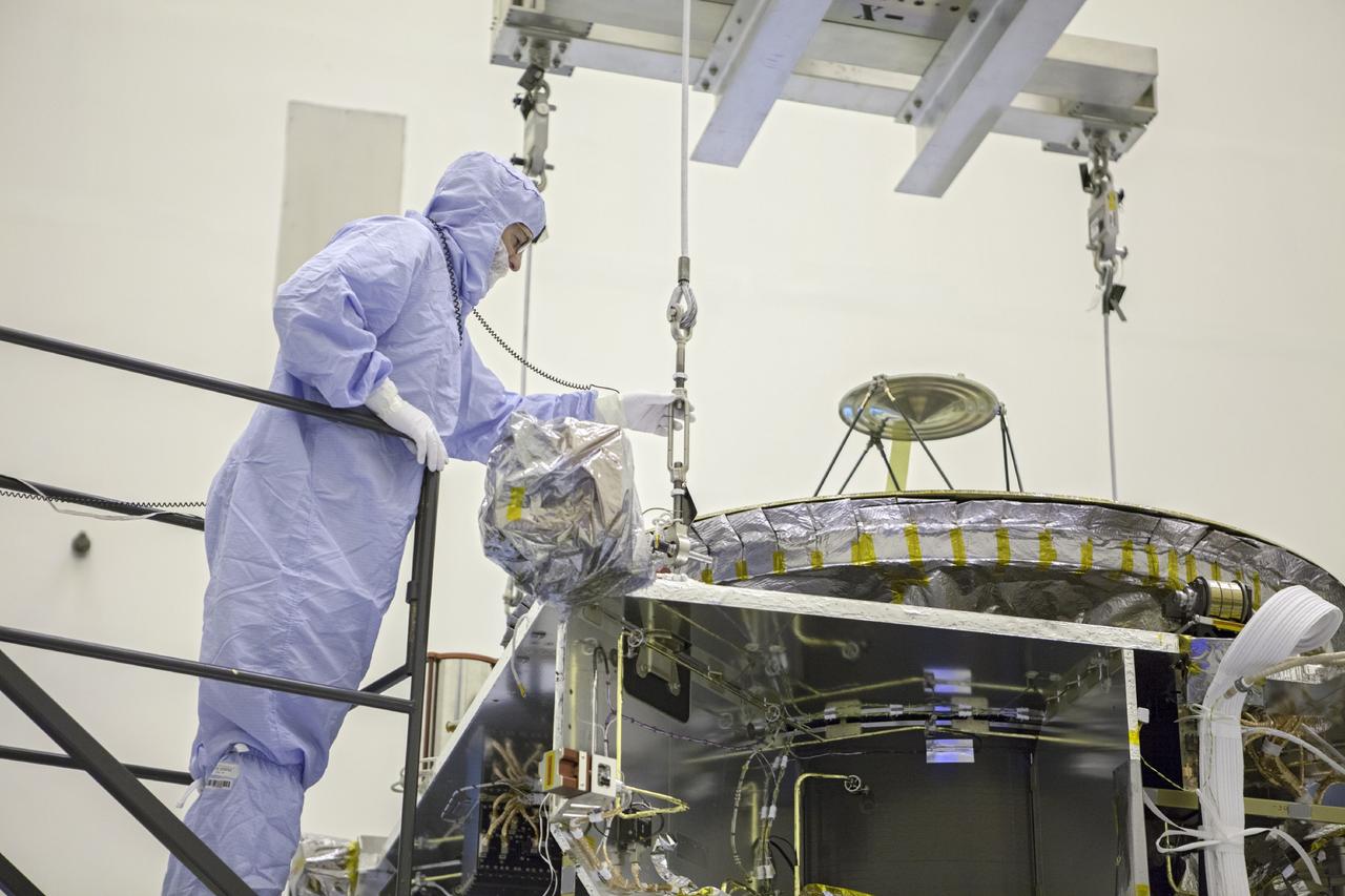 CAPE CANAVERAL, Fla. – Inside the Payload Hazardous Servicing Facility at NASA's Kennedy Space Center in Florida, technicians prepare to hoist the Mars Atmosphere and Volatile Evolution spacecraft, or MAVEN, onto the rotation fixture for further testing and prelaunch preparations next week. MAVEN is being readied for its scheduled November launch aboard a United Launch Alliance Atlas V rocket to Mars. Positioned in an orbit above the Red Planet, MAVEN will study the upper atmosphere of Mars in unprecedented detail. Photo credit: NASA/Chris Rhodes