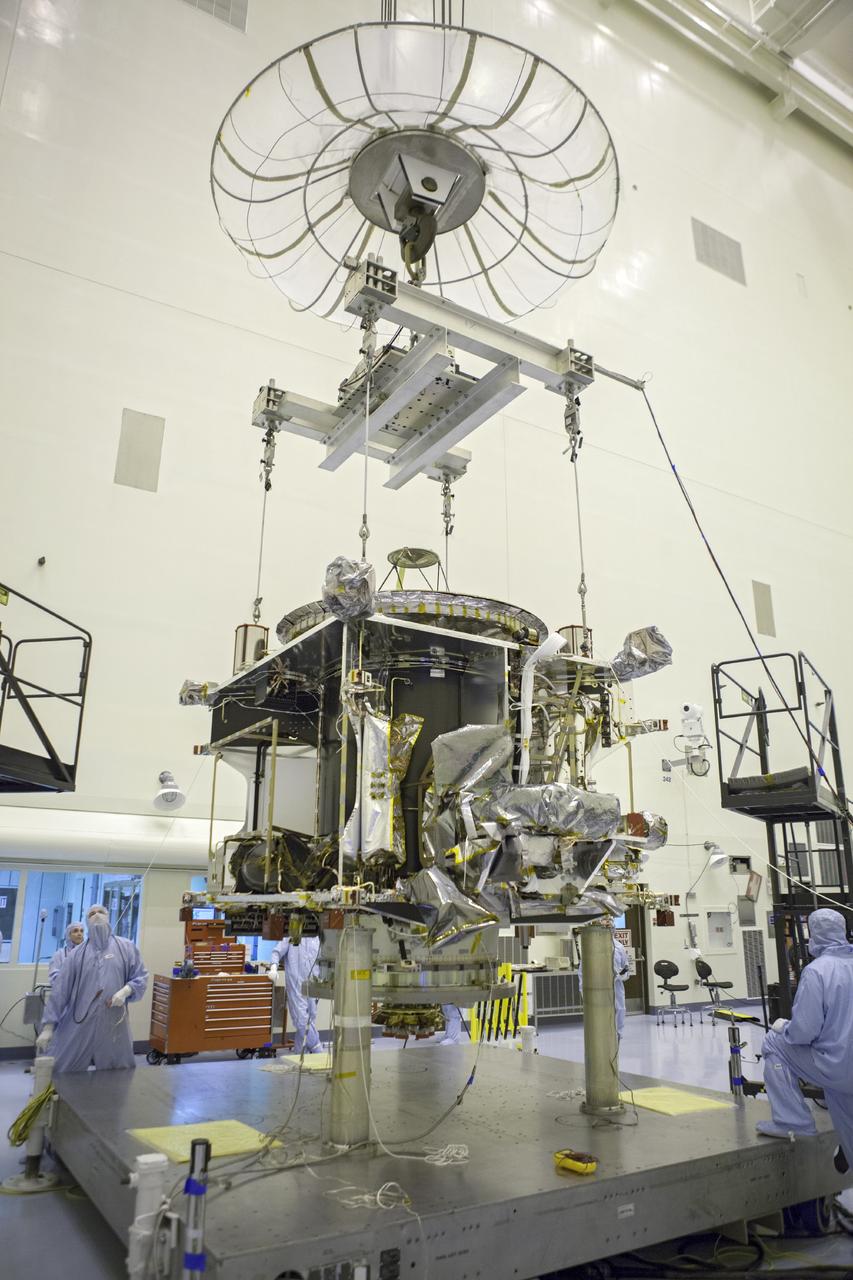 CAPE CANAVERAL, Fla. – Inside the Payload Hazardous Servicing Facility at NASA's Kennedy Space Center in Florida, technicians prepare to hoist the Mars Atmosphere and Volatile Evolution spacecraft, or MAVEN, onto the rotation fixture for further testing and prelaunch preparations next week. MAVEN is being readied for its scheduled November launch aboard a United Launch Alliance Atlas V rocket to Mars. Positioned in an orbit above the Red Planet, MAVEN will study the upper atmosphere of Mars in unprecedented detail. Photo credit: NASA/Chris Rhodes