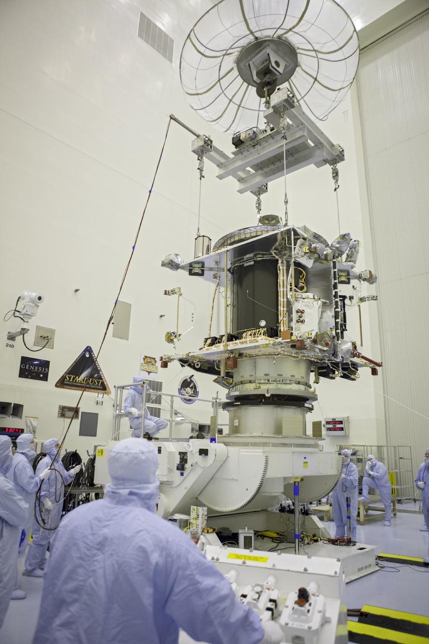 CAPE CANAVERAL, Fla. – Inside the Payload Hazardous Servicing Facility at NASA's Kennedy Space Center in Florida, technicians lower the Mars Atmosphere and Volatile Evolution spacecraft, or MAVEN, onto the rotation fixture for further testing and prelaunch preparations next week. MAVEN is being readied for its scheduled November launch aboard a United Launch Alliance Atlas V rocket to Mars. Positioned in an orbit above the Red Planet, MAVEN will study the upper atmosphere of Mars in unprecedented detail. Photo credit: NASA/Chris Rhodes