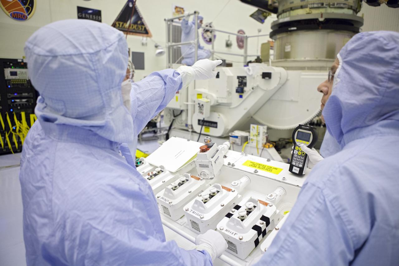 CAPE CANAVERAL, Fla. – Inside the Payload Hazardous Servicing Facility at NASA's Kennedy Space Center in Florida, technicians lower the Mars Atmosphere and Volatile Evolution spacecraft, or MAVEN, onto the rotation fixture for further testing and prelaunch preparations next week. MAVEN is being readied for its scheduled November launch aboard a United Launch Alliance Atlas V rocket to Mars. Positioned in an orbit above the Red Planet, MAVEN will study the upper atmosphere of Mars in unprecedented detail. Photo credit: NASA/Chris Rhodes