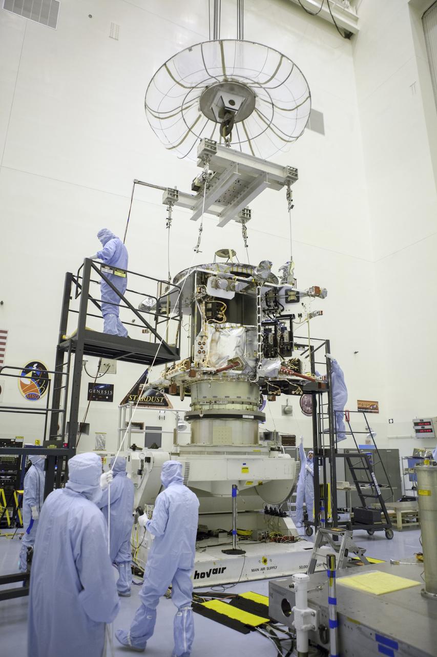 CAPE CANAVERAL, Fla. – Inside the Payload Hazardous Servicing Facility at NASA's Kennedy Space Center in Florida, technicians complete the transfer of the Mars Atmosphere and Volatile Evolution spacecraft, or MAVEN, to the rotation fixture for further testing and prelaunch preparations next week. MAVEN is being readied for its scheduled November launch aboard a United Launch Alliance Atlas V rocket to Mars. Positioned in an orbit above the Red Planet, MAVEN will study the upper atmosphere of Mars in unprecedented detail. Photo credit: NASA/Chris Rhodes