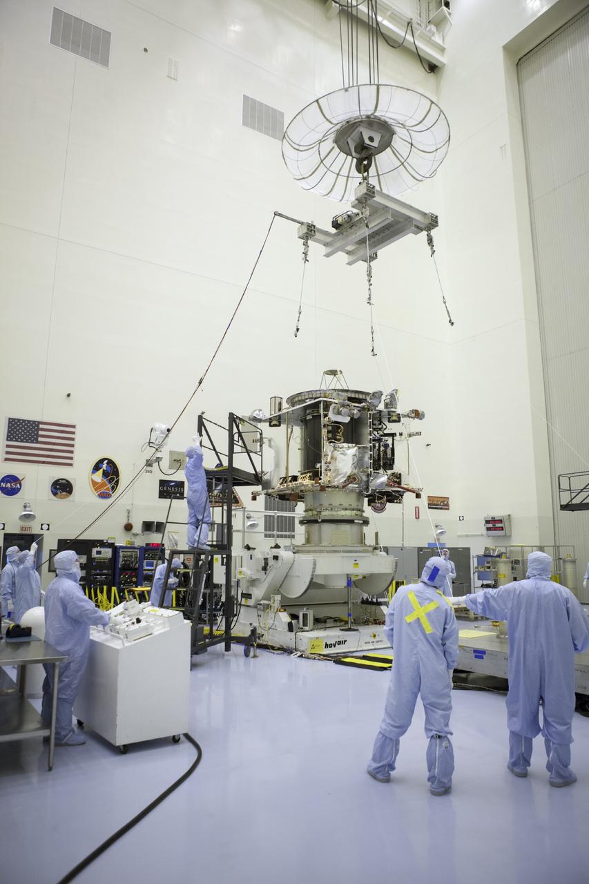 CAPE CANAVERAL, Fla. – Inside the Payload Hazardous Servicing Facility at NASA's Kennedy Space Center in Florida, technicians complete the transfer of the Mars Atmosphere and Volatile Evolution spacecraft, or MAVEN, to the rotation fixture for further testing and prelaunch preparations next week. MAVEN is being readied for its scheduled November launch aboard a United Launch Alliance Atlas V rocket to Mars. Positioned in an orbit above the Red Planet, MAVEN will study the upper atmosphere of Mars in unprecedented detail. Photo credit: NASA/Chris Rhodes