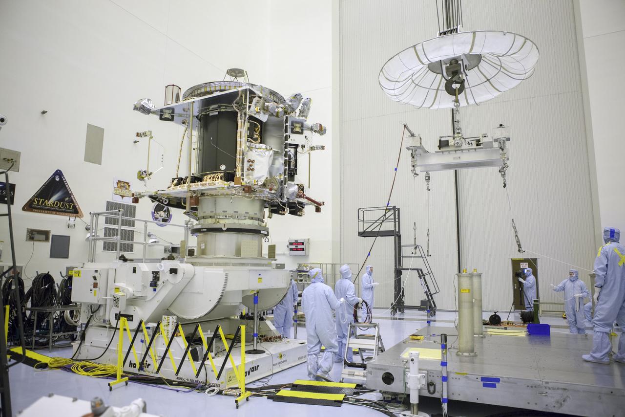 CAPE CANAVERAL, Fla. – Inside the Payload Hazardous Servicing Facility at NASA's Kennedy Space Center in Florida, technicians move aside the crane used to transfer of the Mars Atmosphere and Volatile Evolution spacecraft, or MAVEN, to the rotation fixture for further testing and prelaunch preparations next week. MAVEN is being readied for its scheduled November launch aboard a United Launch Alliance Atlas V rocket to Mars. Positioned in an orbit above the Red Planet, MAVEN will study the upper atmosphere of Mars in unprecedented detail. Photo credit: NASA/Chris Rhodes