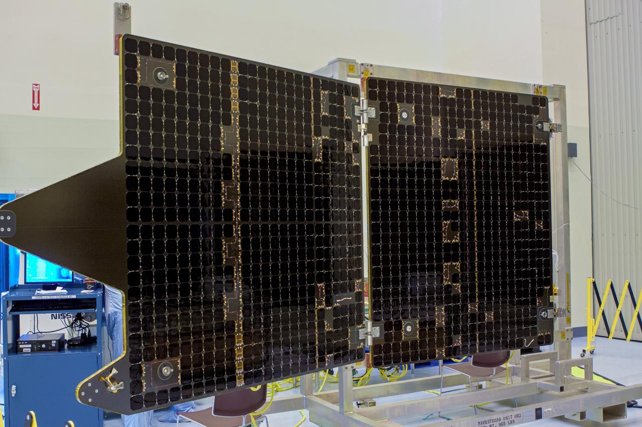 CAPE CANAVERAL, Fla. – Inside the Payload Hazardous Servicing Facility at NASA's Kennedy Space Center in Florida, testing is underway on the electricity-producing solar arrays for the Mars Atmosphere and Volatile Evolution, or MAVEN, spacecraft.      MAVEN is being prepared for its scheduled launch in November from Cape Canaveral Air Force Station, Fla. atop a United Launch Alliance Atlas V rocket. Positioned in an orbit above the Red Planet, MAVEN will study the upper atmosphere of Mars in unprecedented detail. For more information, visit: http://www.nasa.gov/mission_pages/maven/main/index.html Photo credit: NASA/ Jim Grossmann