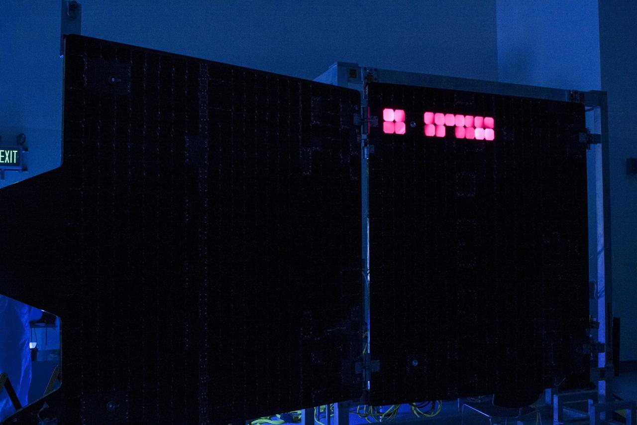 CAPE CANAVERAL, Fla. – Inside the Payload Hazardous Servicing Facility at NASA's Kennedy Space Center in Florida, illumination testing is underway on the electricity-producing solar arrays for the Mars Atmosphere and Volatile Evolution, or MAVEN, spacecraft.      MAVEN is being prepared for its scheduled launch in November from Cape Canaveral Air Force Station, Fla. atop a United Launch Alliance Atlas V rocket. Positioned in an orbit above the Red Planet, MAVEN will study the upper atmosphere of Mars in unprecedented detail. For more information, visit: http://www.nasa.gov/mission_pages/maven/main/index.html Photo credit: NASA/ Jim Grossmann