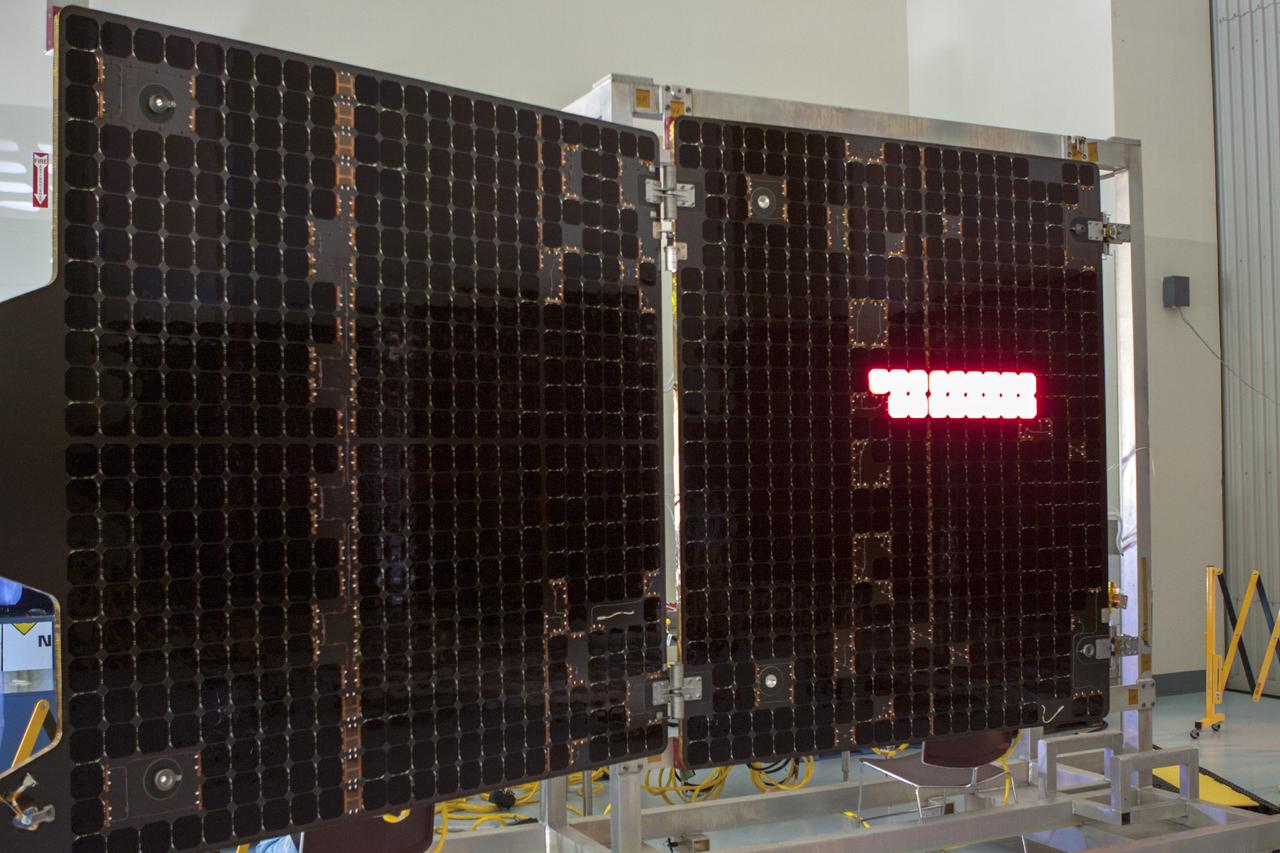 CAPE CANAVERAL, Fla. – Inside the Payload Hazardous Servicing Facility at NASA's Kennedy Space Center in Florida, illumination testing is underway on the electricity-producing solar arrays for the Mars Atmosphere and Volatile Evolution, or MAVEN, spacecraft.      MAVEN is being prepared for its scheduled launch in November from Cape Canaveral Air Force Station, Fla. atop a United Launch Alliance Atlas V rocket. Positioned in an orbit above the Red Planet, MAVEN will study the upper atmosphere of Mars in unprecedented detail. For more information, visit: http://www.nasa.gov/mission_pages/maven/main/index.html Photo credit: NASA/ Jim Grossmann