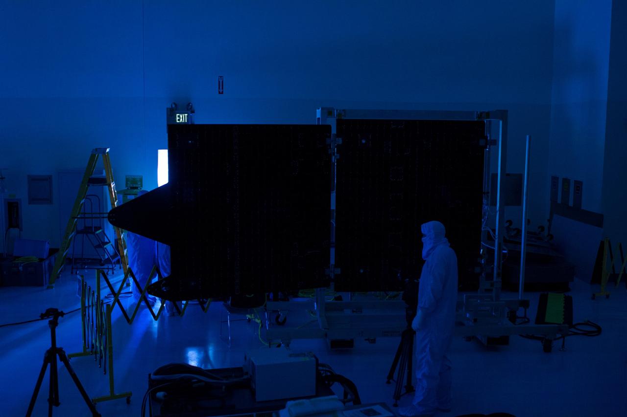 CAPE CANAVERAL, Fla. – Inside the Payload Hazardous Servicing Facility at NASA's Kennedy Space Center in Florida, illumination testing is underway on the electricity-producing solar arrays for the Mars Atmosphere and Volatile Evolution, or MAVEN, spacecraft.      MAVEN is being prepared for its scheduled launch in November from Cape Canaveral Air Force Station, Fla. atop a United Launch Alliance Atlas V rocket. Positioned in an orbit above the Red Planet, MAVEN will study the upper atmosphere of Mars in unprecedented detail. For more information, visit: http://www.nasa.gov/mission_pages/maven/main/index.html Photo credit: NASA/ Jim Grossmann