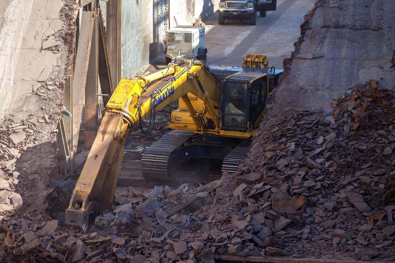 CAPE CANAVERAL, Fla. – A construction crew uses heavy machinery to take apart the flame deflector at Launch Complex 39B as the flame trench is refurbished for future rocket launches at NASA's Kennedy Space Center in Florida. Photo credit: NASA/Daniel Casper