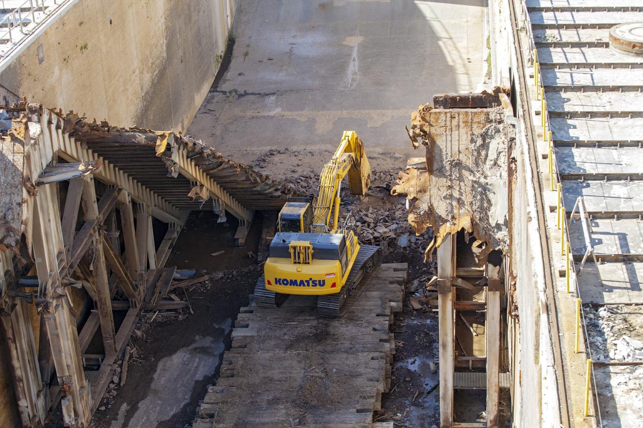 CAPE CANAVERAL, Fla. – A construction crew uses heavy machinery to take apart the flame deflector at Launch Complex 39B as the flame trench is refurbished for future rocket launches at NASA's Kennedy Space Center in Florida. Photo credit: NASA/Daniel Casper