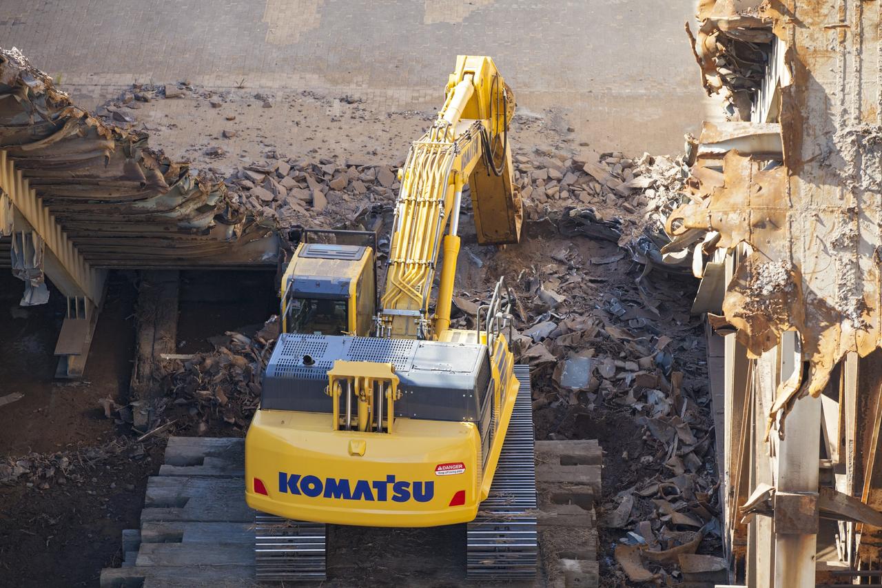 CAPE CANAVERAL, Fla. – A construction crew uses heavy machinery to take apart the flame deflector at Launch Complex 39B as the flame trench is refurbished for future rocket launches at NASA's Kennedy Space Center in Florida. Photo credit: NASA/Daniel Casper