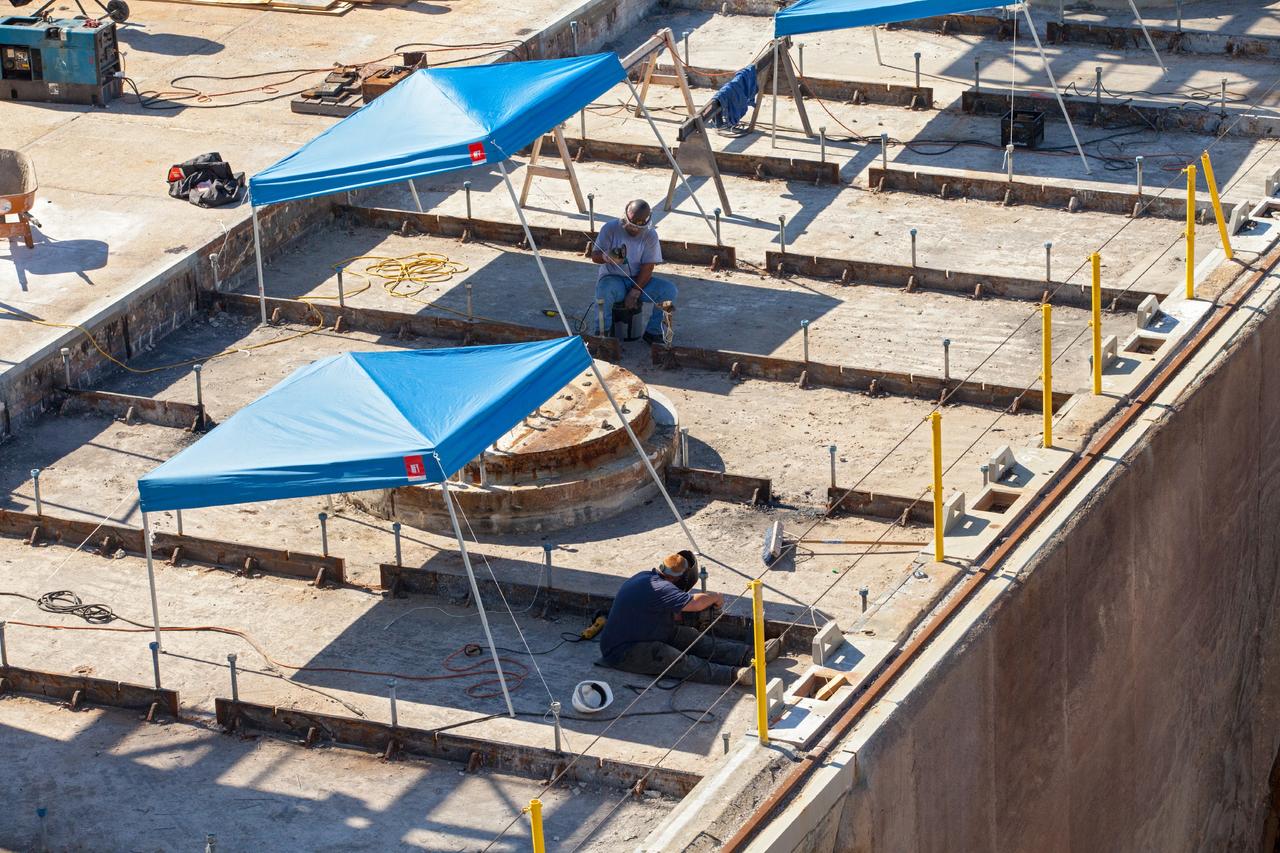 CAPE CANAVERAL, Fla. – A construction crew uses heavy machinery to take apart the flame deflector at Launch Complex 39B as the flame trench is refurbished for future rocket launches at NASA's Kennedy Space Center in Florida. Photo credit: NASA/Daniel Casper