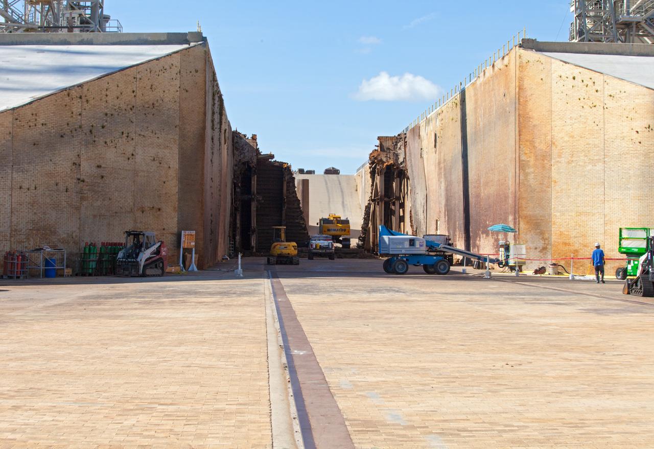 CAPE CANAVERAL, Fla. – A construction crew uses heavy machinery to take apart the flame deflector at Launch Complex 39B as the flame trench is refurbished for future rocket launches at NASA's Kennedy Space Center in Florida. Photo credit: NASA/Daniel Casper