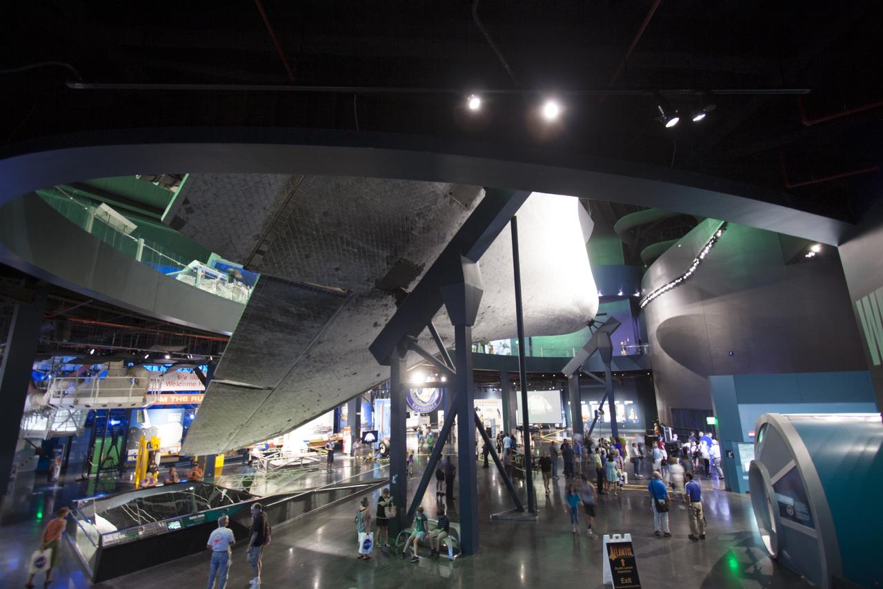 CAPE CANAVERAL, Fla. -- At the Kennedy Space Center Visitor Complex in Florida, the Space Shuttle Atlantis and other exhibits are now on display inside the 90,000-square-foot facility.      The time capsule, containing artifacts and other memorabilia associated with the history of the program is designated to be opened on the 50th anniversary of the shuttle's final landing, STS-135. The new $100 million "Space Shuttle Atlantis" facility includes interactive exhibits that tell the story of the 30-year Space Shuttle Program and highlight the future of space exploration. Photo credit: NASA/Jim Grossmann