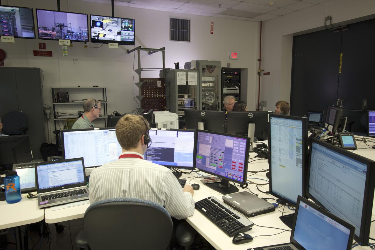CAPE CANAVERAL, Fla. – At NASA's Kennedy Space Center in Florida, engineers are running tests between the Mars Atmosphere and Volatile Evolution, or MAVEN, spacecraft and MIL-71. The control room is the Kennedy interface with the Deep Space Network, or DSN. This compatibility test with MAVEN will verify that the spacecraft will be able to relay data back through the DSN interfaces during its mission to the Red Planet. MAVEN is being prepared for its scheduled launch in November from Cape Canaveral Air Force Station, Fla. atop a United Launch Alliance Atlas V rocket. Positioned in an orbit above the Red Planet, MAVEN will study the upper atmosphere of Mars in unprecedented detail. For more information, visit: http://www.nasa.gov/mission_pages/maven/main/index.html Photo credit: NASA/Jim Grossmann