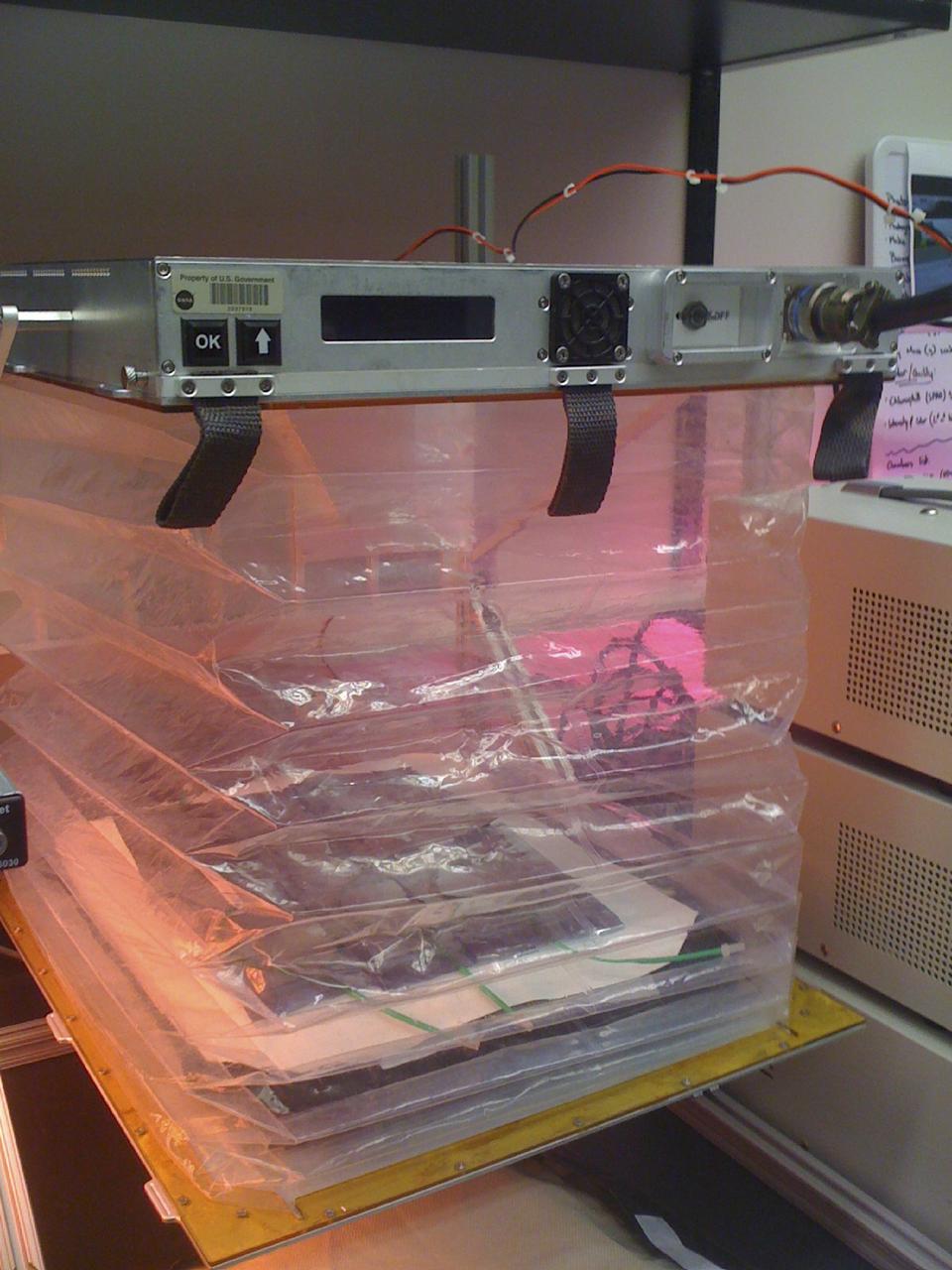 CAPE CANAVERAL, Fla. – This prototype VEGGIE hardware was designed and built by Orbital Technologies Corp. of Madison, Wisc.        U.S. astronauts living and working aboard the International Space Station are going to receive a newly developed Vegetable Production System VEGGIE. VEGGIE is set to launch aboard SpaceX's Dragon capsule on NASA's third Commercial Resupply Services mission targeted to launch Dec. 9 from Space Launch Complex 40 at Cape Canaveral Air Force Station in Florida. Photo credit: NASA/Gioia Massa