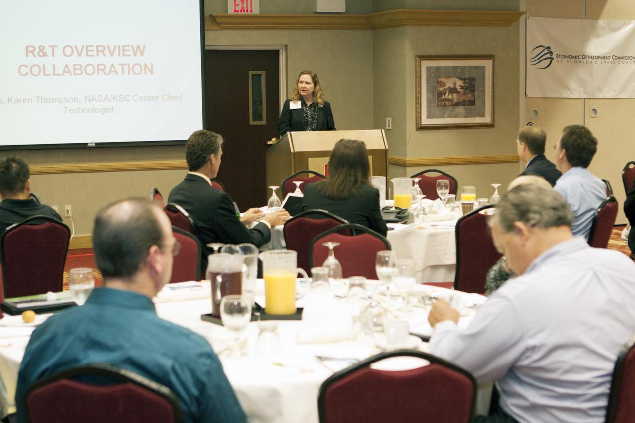 CAPE CANAVERAL, Fla. – Karen Thompson, chief technologist at NASA's Kennedy Space Center in Florida, discusses technology transfer with attendees at the Technology Transfer Forum of the Economic Development Commission of Florida's Space Coast. A goal of the session was to showcase ways commercial businesses can work with NASA to develop technology and apply existing technology to commercial uses. Photo credit: NASA/Glenn Benson