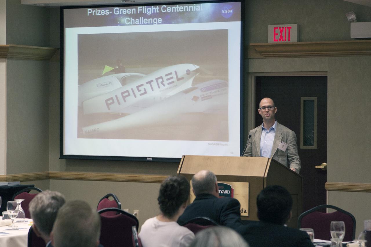 CAPE CANAVERAL, Fla. – Jason Kessler, NASA Asteroid Grand Challenge program executive, discusses the Asteroid Grand Challenge program opportunities with attendees at the Technology Transfer Forum of the Economic Development Commission of Florida's Space Coast. A goal of the session was to showcase ways commercial businesses can work with NASA to develop technology and apply existing technology to commercial uses. Photo credit: NASA/Glenn Benson