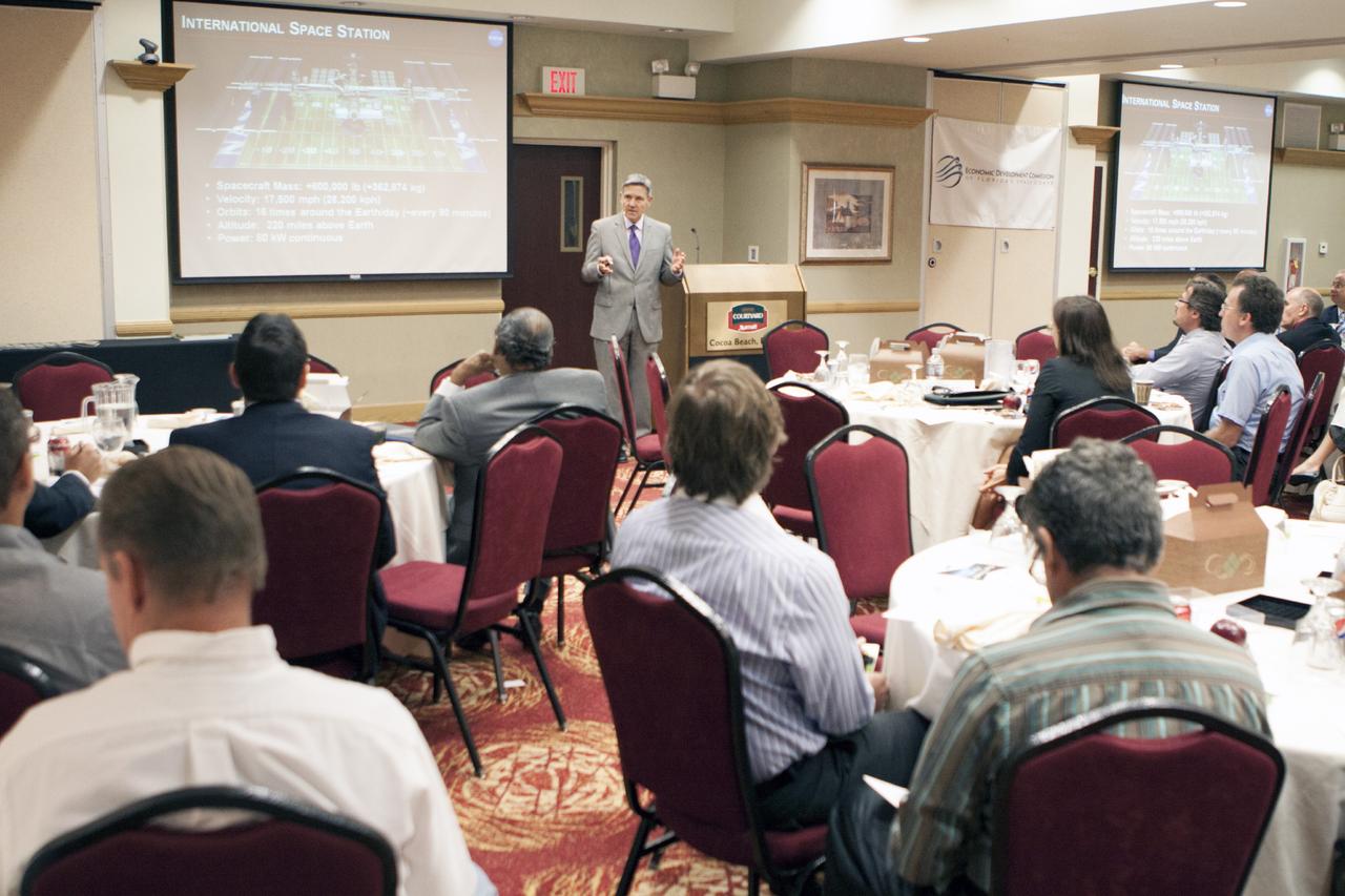 CAPE CANAVERAL, Fla. – Bob Cabana, director of NASA's Kennedy Space Center in Florida, discusses technology transfer with attendees at the Technology Transfer Forum of the Economic Development Commission of Florida's Space Coast. A goal of the session was to showcase ways commercial businesses can work with NASA to develop technology and apply existing technology to commercial uses. Photo credit: NASA/Glenn Benson
