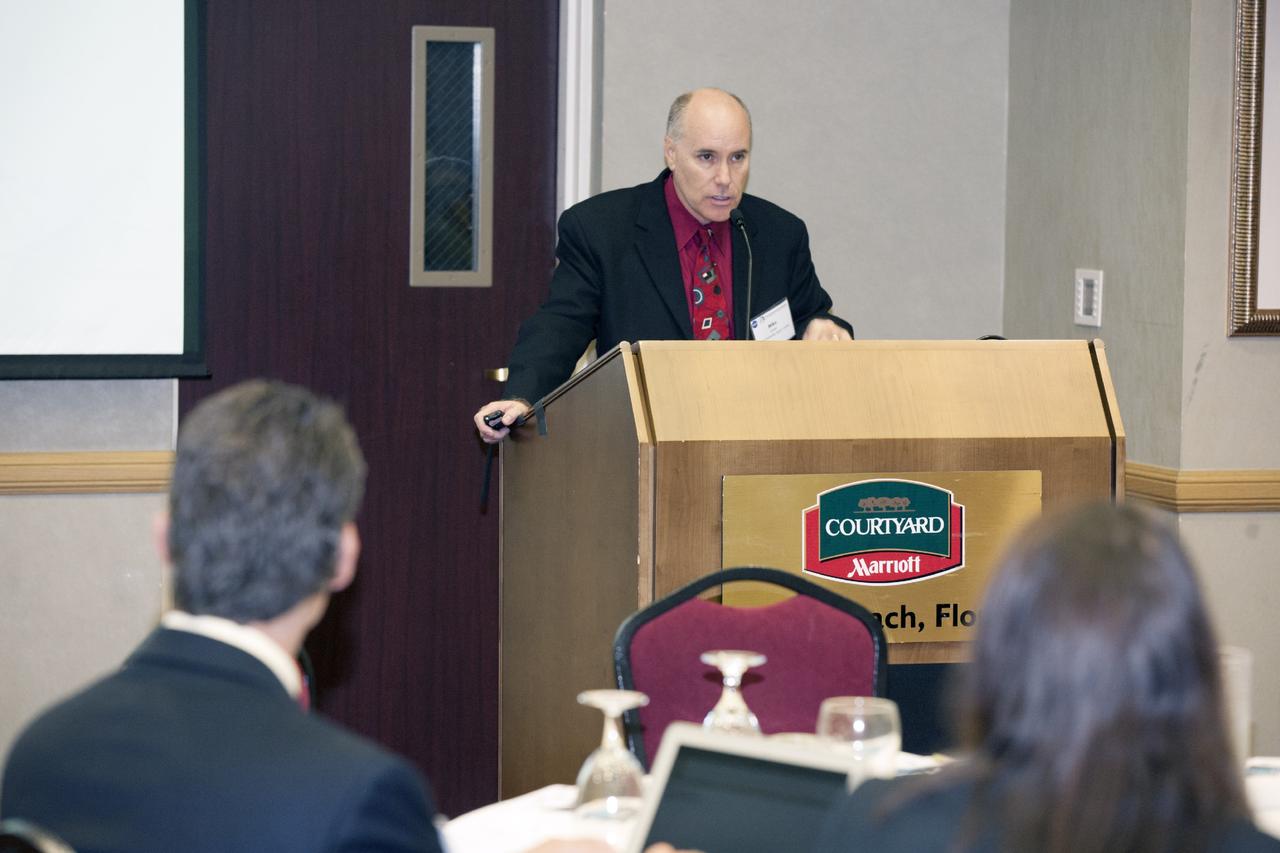 CAPE CANAVERAL, Fla. – Mike Lester, Research and Technology Partnership manager at NASA's Kennedy Space Center in Florida, discusses technology transfer with attendees at the Technology Transfer Forum of the Economic Development Commission of Florida's Space Coast. A goal of the session was to showcase ways commercial businesses can work with NASA to develop technology and apply existing technology to commercial uses. Photo credit: NASA/Glenn Benson