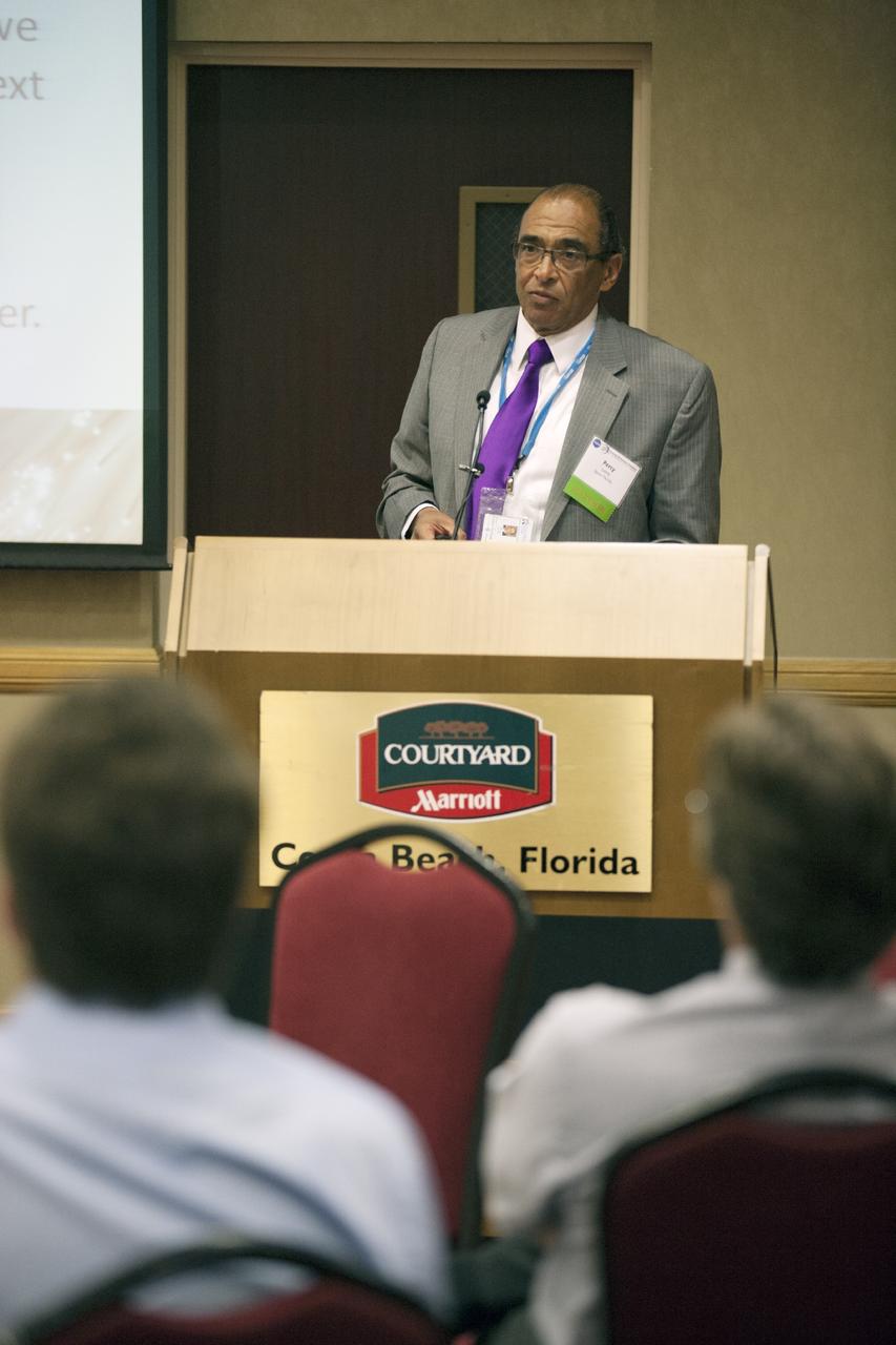 CAPE CANAVERAL, Fla. – Percy Luney of Space Florida discusses technology transfer with attendees at the Technology Transfer Forum of the Economic Development Commission of Florida's Space Coast. A goal of the session was to showcase ways commercial businesses can work with NASA to develop technology and apply existing technology to commercial uses. Photo credit: NASA/Glenn Benson