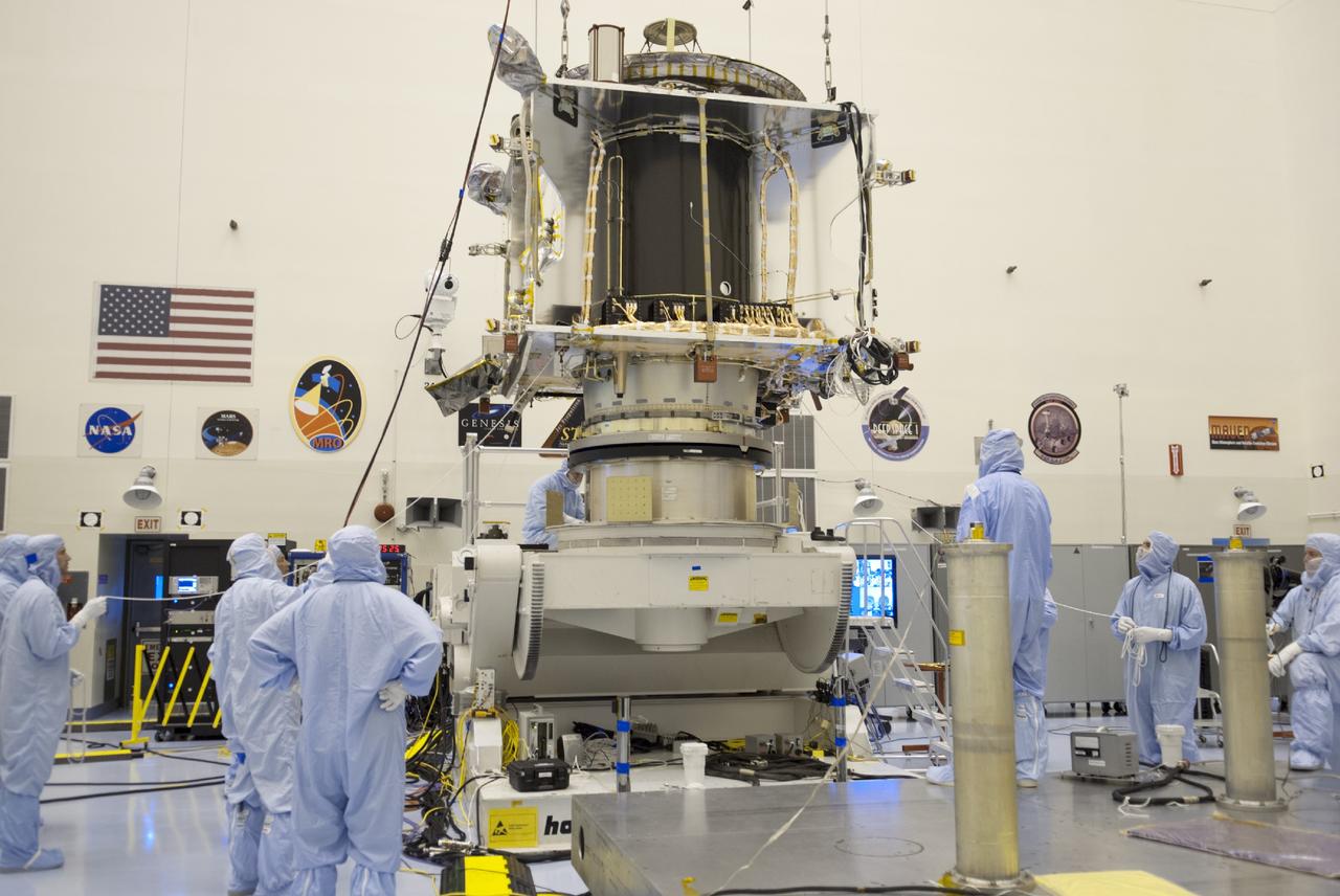 CAPE CANAVERAL, Fla. – Inside the Payload Hazardous Servicing Facility at NASA's Kennedy Space Center in Florida, engineers and technicians use a crane to place the Mars Atmosphere and Volatile Evolution, or MAVEN, spacecraft on a tilt and rotation stand for further pre-flight processing.      MAVEN is being prepared for its scheduled launch in November from Cape Canaveral Air Force Station, Fla. atop a United Launch Alliance Atlas V rocket. Positioned in an orbit above the Red Planet, MAVEN will study the upper atmosphere of Mars in unprecedented detail. For more information, visit: http://www.nasa.gov/mission_pages/maven/main/index.html Photo credit: NASA/ Charisse Nahser