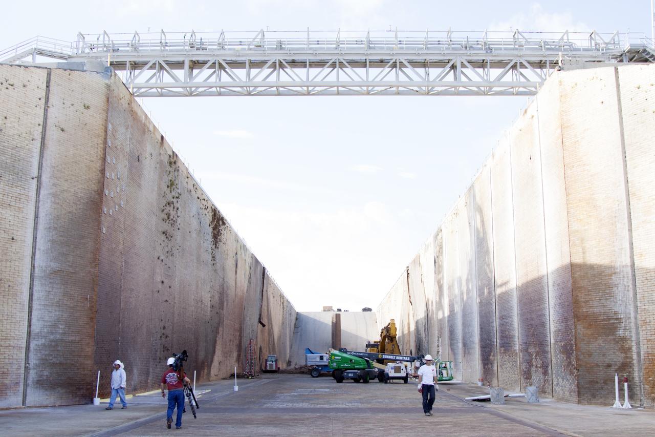 CAPE CANAVERAL, Fla. – At Launch Pad 39B at NASA’s Kennedy Space Center in Florida, the flame trench deflector that was located below and between the left and right crawlerway tracks has been removed.    Pad B is being refurbished to support NASA’s Space Launch System and other launch vehicles. The Ground Systems Development and Operations, or GSDO, Program at Kennedy is leading the center’s transformation to safely handle a variety of rockets and spacecraft. For more information about GSDO, visit: http://go.nasa.gov/groundsystems.  Photo credit: NASA/Jim Grossman