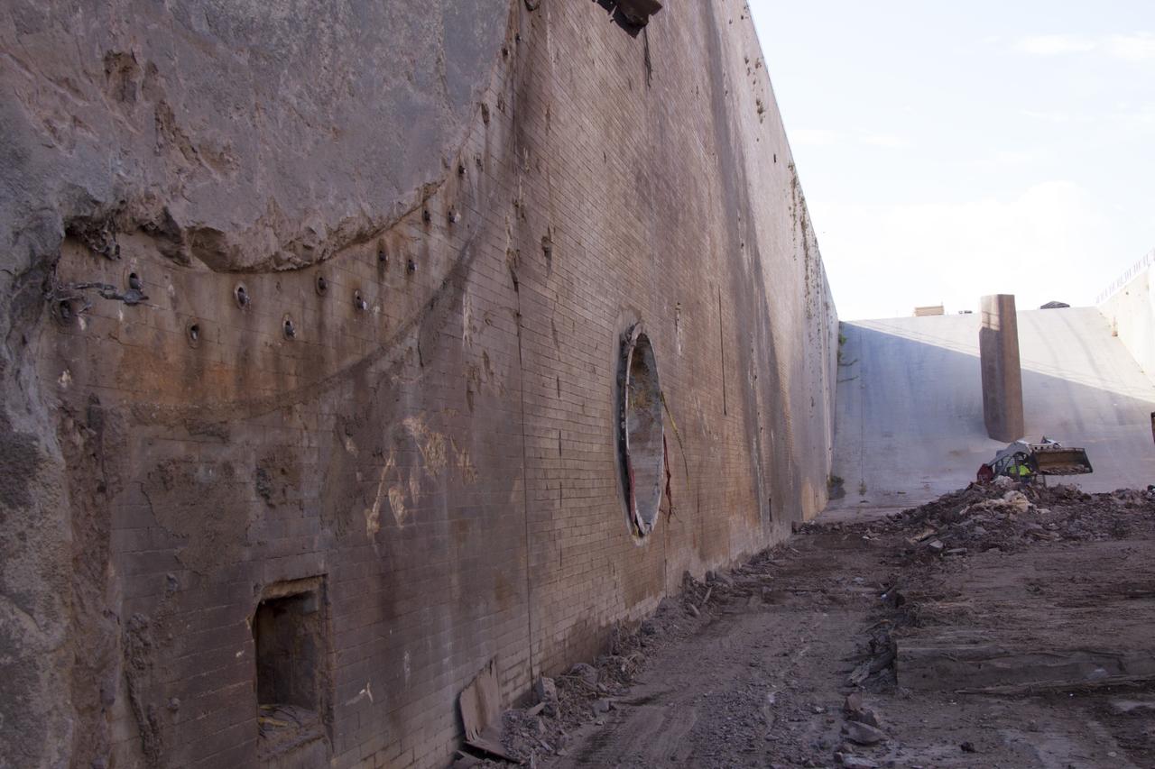 CAPE CANAVERAL, Fla. – At Launch Pad 39B at NASA’s Kennedy Space Center in Florida, the flame trench deflector that was located below and between the left and right crawlerway tracks has been removed. Work will continue to repair or replace the bricks on the walls.    Pad B is being refurbished to support NASA’s Space Launch System and other launch vehicles. The Ground Systems Development and Operations, or GSDO, Program at Kennedy is leading the center’s transformation to safely handle a variety of rockets and spacecraft. For more information about GSDO, visit: http://go.nasa.gov/groundsystems.  Photo credit: NASA/Jim Grossman