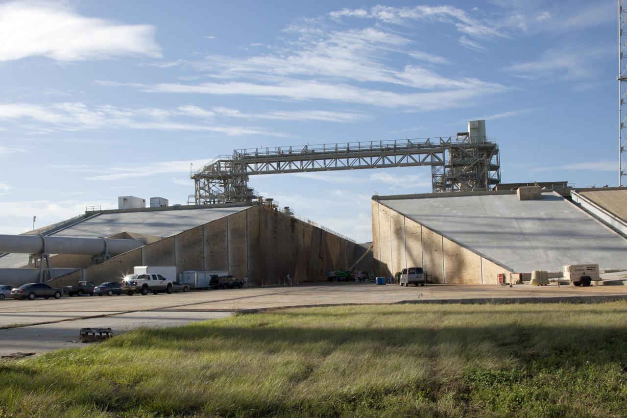 CAPE CANAVERAL, Fla. – At Launch Pad 39B at NASA’s Kennedy Space Center in Florida, the flame trench deflector located below and between the left and right crawlerway tracks has been removed.     Pad B is being refurbished to support NASA’s Space Launch System and other launch vehicles. The Ground Systems Development and Operations, or GSDO, Program at Kennedy is leading the center’s transformation to safely handle a variety of rockets and spacecraft. For more information about GSDO, visit: http://go.nasa.gov/groundsystems.  Photo credit: NASA/Jim Grossman