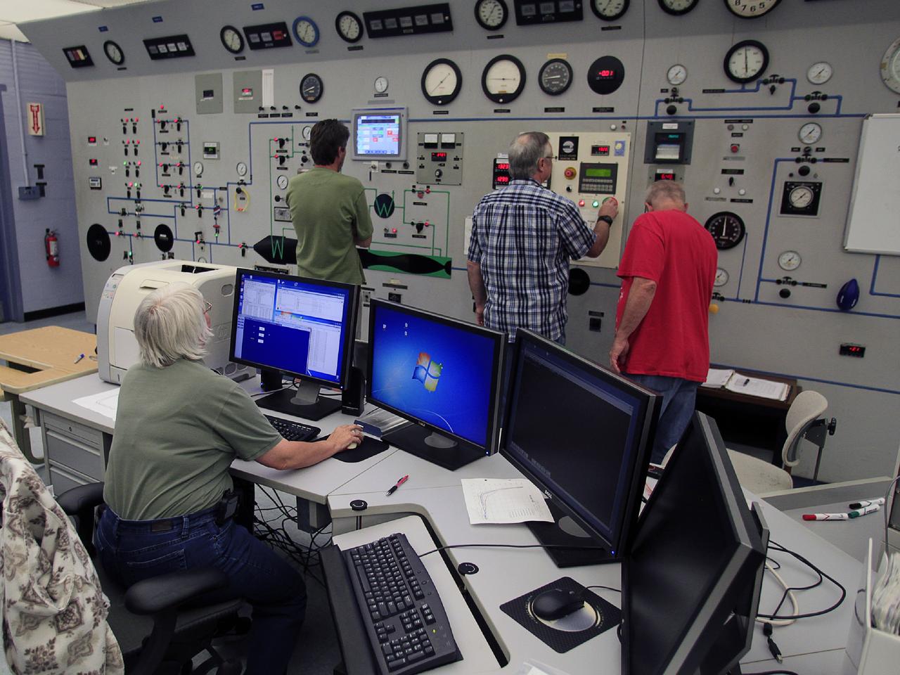 HAMPTON, Va. –Engineers monitor high-speed wind tunnel testing of a 10-inch long ceramic model of the Sierra Nevada Corporation, or SNC, Dream Chaser spacecraft at NASA's Langley Research Center in Hampton, Va. The tests measure how much heat the winged vehicle would experience during ascent and re-entry through the atmosphere, including the spacecraft's lower- and upper-body flaps, elevons and a rudder. They're also helping the company obtain necessary data for the material selection and design of the spacecraft's thermal protection system.      SNC is continuing the development of its Dream Chaser spacecraft under the agency's Commercial Crew Integrated Capability, or CCiCap, initiative, which is intended to lead to the availability of commercial human spaceflight services for government and commercial customers. To learn more about CCP and its industry partners, visit www.nasa.gov/commercialcrew. Image credit: NASA/David Bowman
