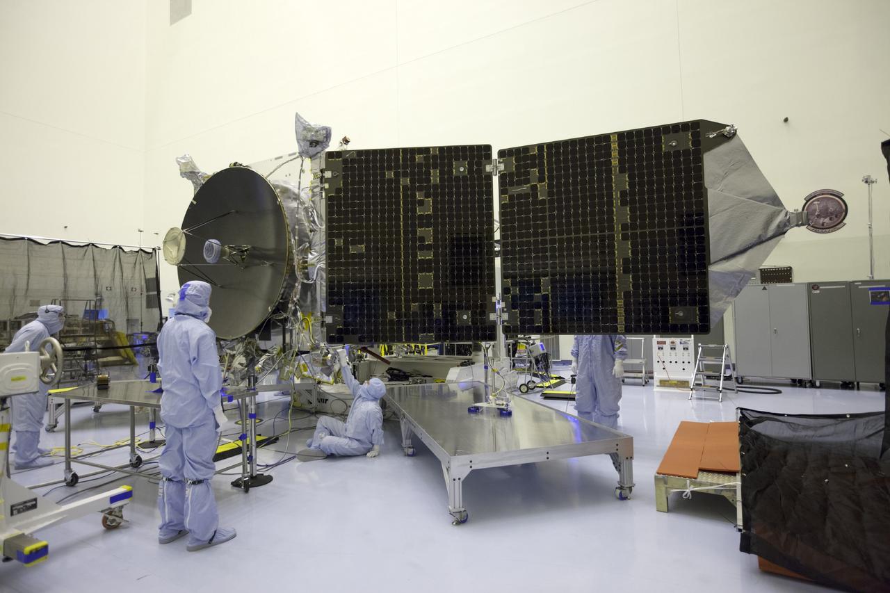 CAPE CANAVERAL, Fla. – Inside the Payload Hazardous Servicing Facility at NASA's Kennedy Space Center in Florida, engineers and technicians test deploy the twin solar arrays on the Mars Atmosphere and Volatile Evolution, or MAVEN, spacecraft.      MAVEN is being prepared for its scheduled launch in November from Cape Canaveral Air Force Station, Fla. atop a United Launch Alliance Atlas V rocket. Positioned in an orbit above the Red Planet, MAVEN will study the upper atmosphere of Mars in unprecedented detail. For more information, visit: http://www.nasa.gov/mission_pages/maven/main/index.html Photo credit: NASA/Kim Shiflett