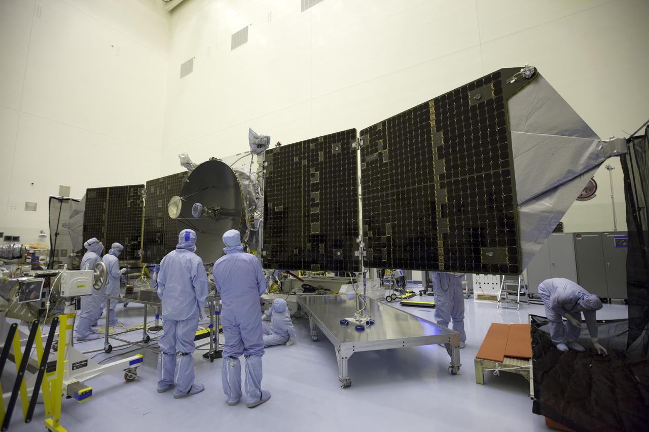 CAPE CANAVERAL, Fla. – Inside the Payload Hazardous Servicing Facility at NASA's Kennedy Space Center in Florida, engineers and technicians test deploy the twin solar arrays on the Mars Atmosphere and Volatile Evolution, or MAVEN, spacecraft.      MAVEN is being prepared for its scheduled launch in November from Cape Canaveral Air Force Station, Fla. atop a United Launch Alliance Atlas V rocket. Positioned in an orbit above the Red Planet, MAVEN will study the upper atmosphere of Mars in unprecedented detail. For more information, visit: http://www.nasa.gov/mission_pages/maven/main/index.html Photo credit: NASA/Kim Shiflett