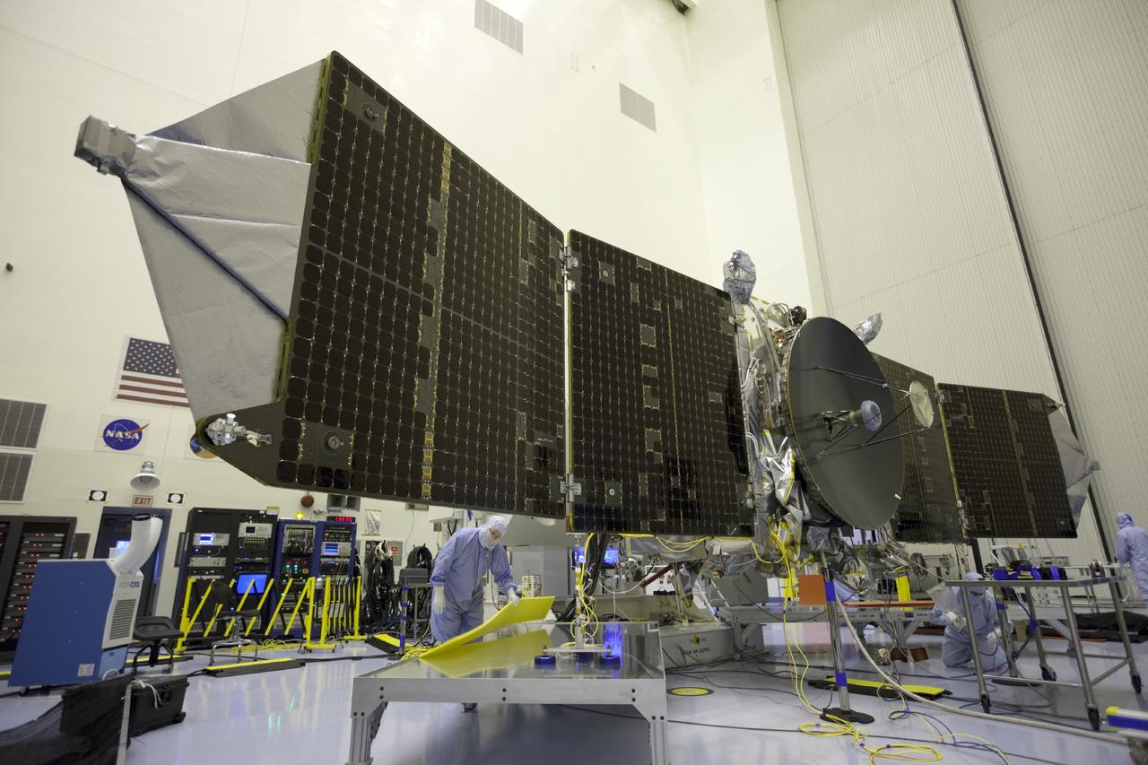 CAPE CANAVERAL, Fla. – Inside the Payload Hazardous Servicing Facility at NASA's Kennedy Space Center in Florida, engineers and technicians test deploy the twin solar arrays on the Mars Atmosphere and Volatile Evolution, or MAVEN, spacecraft.      MAVEN is being prepared for its scheduled launch in November from Cape Canaveral Air Force Station, Fla. atop a United Launch Alliance Atlas V rocket. Positioned in an orbit above the Red Planet, MAVEN will study the upper atmosphere of Mars in unprecedented detail. For more information, visit: http://www.nasa.gov/mission_pages/maven/main/index.html Photo credit: NASA/Kim Shiflett