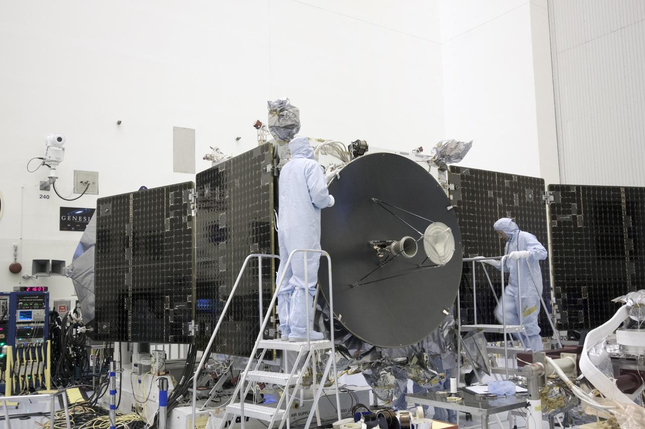 CAPE CANAVERAL, Fla. – Inside the Payload Hazardous Servicing Facility at NASA's Kennedy Space Center in Florida, engineers and technicians prepare to install a radome over the antenna for the Mars Atmosphere and Volatile Evolution, or MAVEN, spacecraft. The radome is a coated kapton cover providing thermal protection for the high gain antenna while not interfering with radio frequency transmissions from the spacecraft.      MAVEN is being prepared for its scheduled launch in November from Cape Canaveral Air Force Station, Fla. atop a United Launch Alliance Atlas V rocket. Positioned in an orbit above the Red Planet, MAVEN will study the upper atmosphere of Mars in unprecedented detail. For more information, visit: http://www.nasa.gov/mission_pages/maven/main/index.html Photo credit: NASA/Jim Grossmann